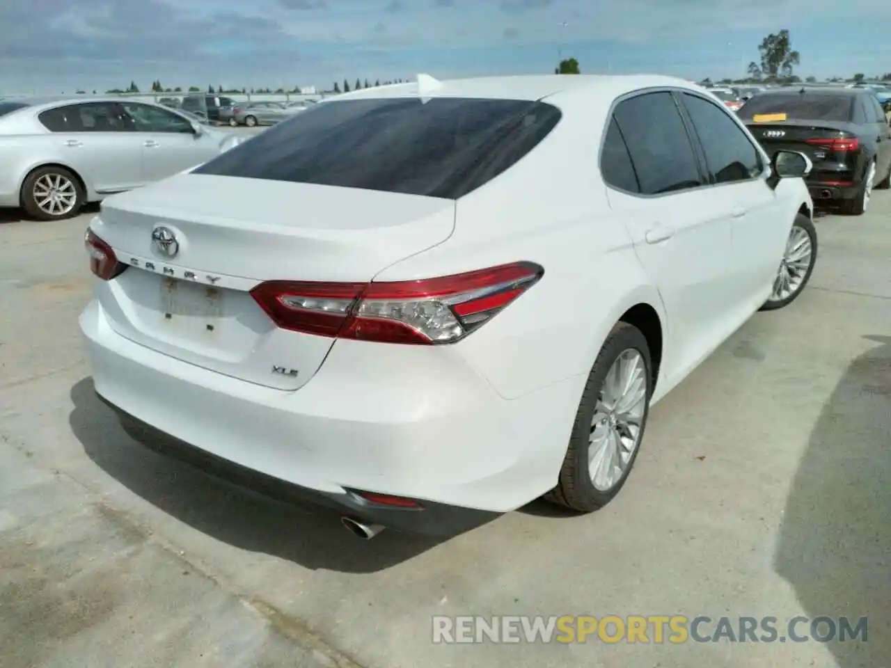 4 Photograph of a damaged car 4T1B11HKXKU748943 TOYOTA CAMRY 2019