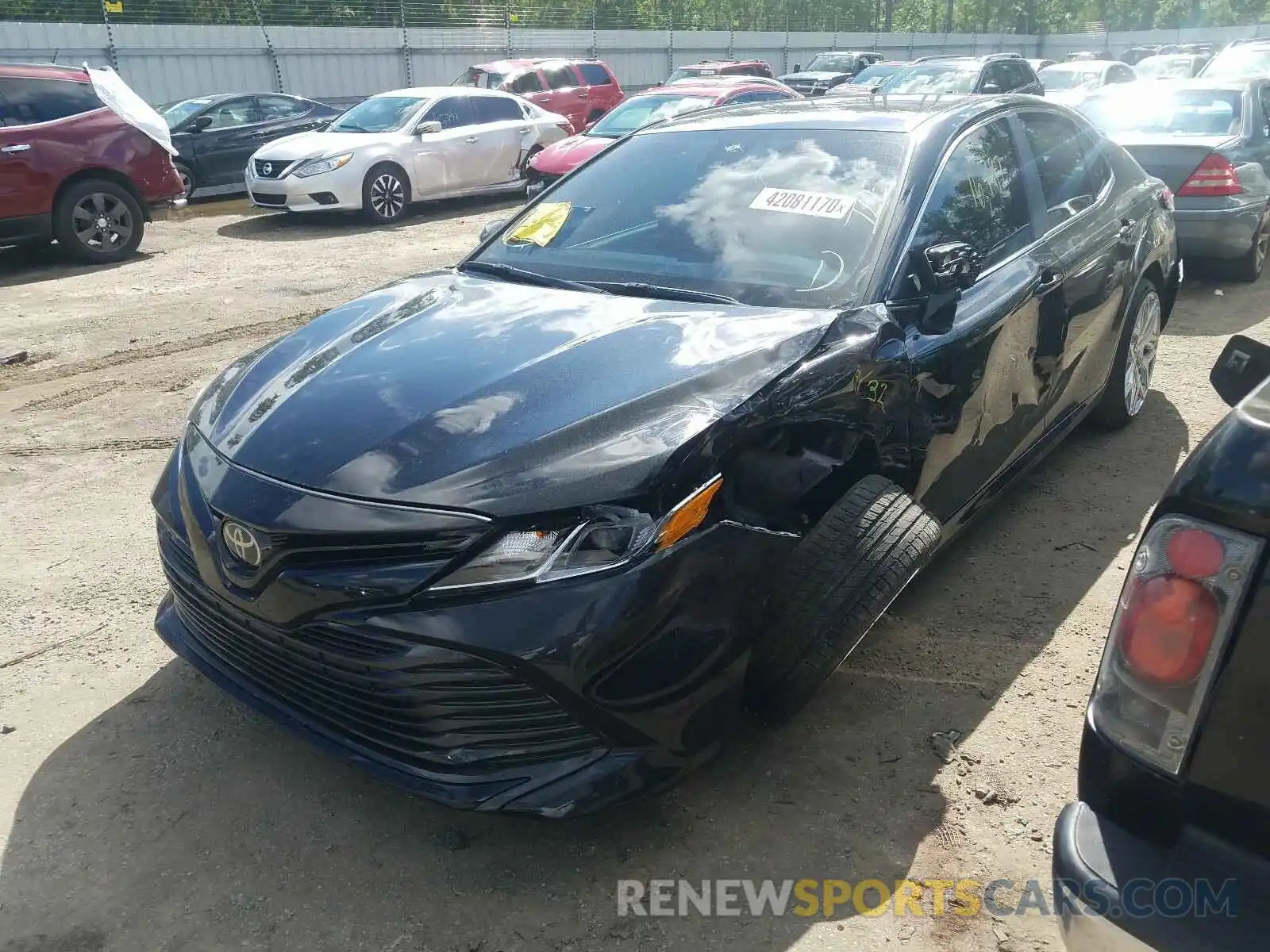 2 Photograph of a damaged car 4T1B11HKXKU749297 TOYOTA CAMRY 2019