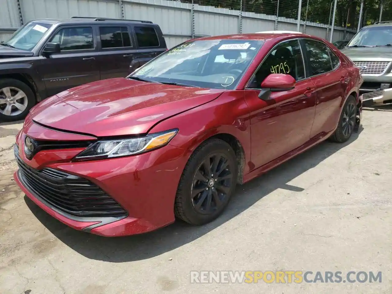 2 Photograph of a damaged car 4T1B11HKXKU749834 TOYOTA CAMRY 2019