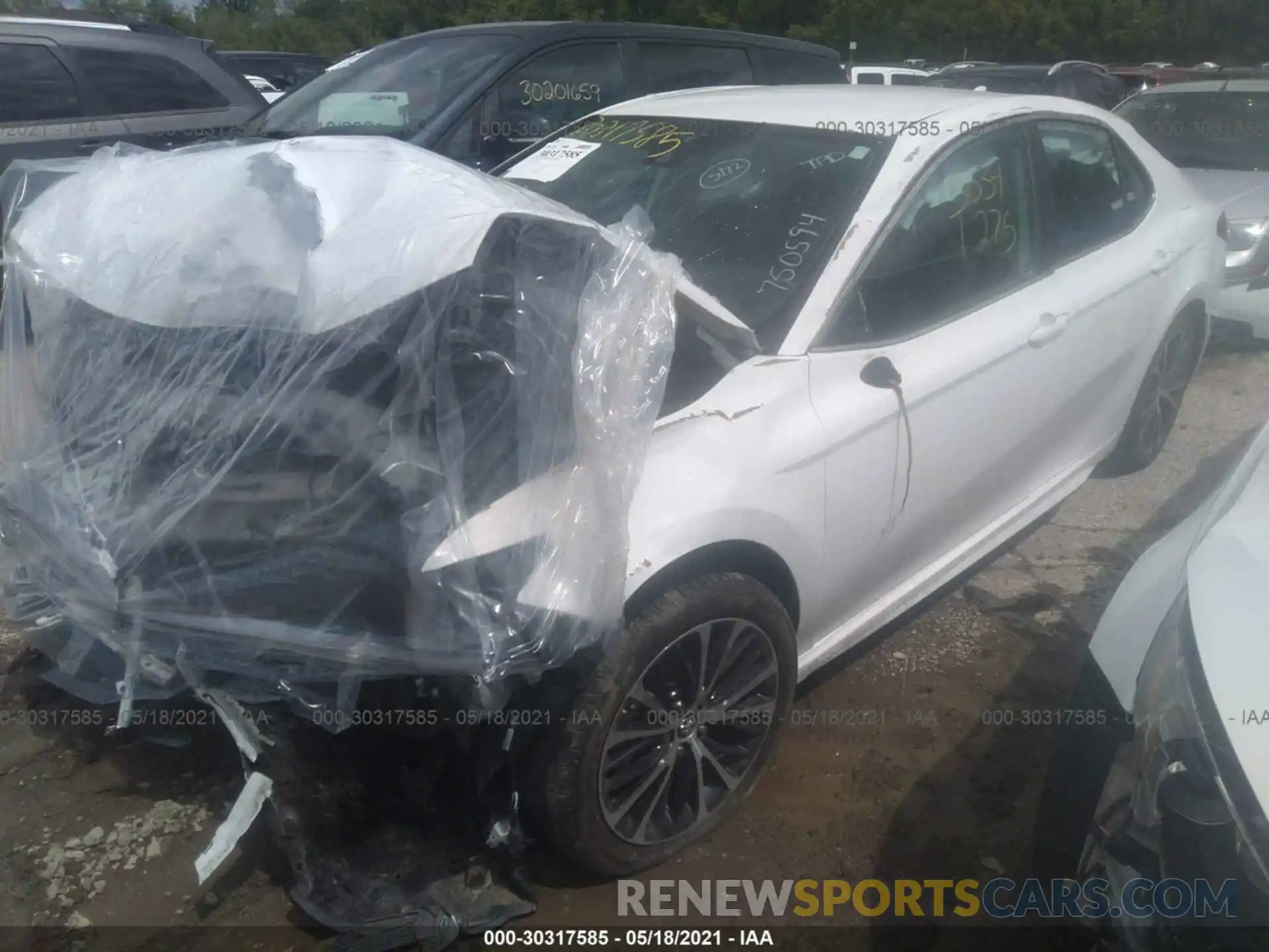 2 Photograph of a damaged car 4T1B11HKXKU750594 TOYOTA CAMRY 2019