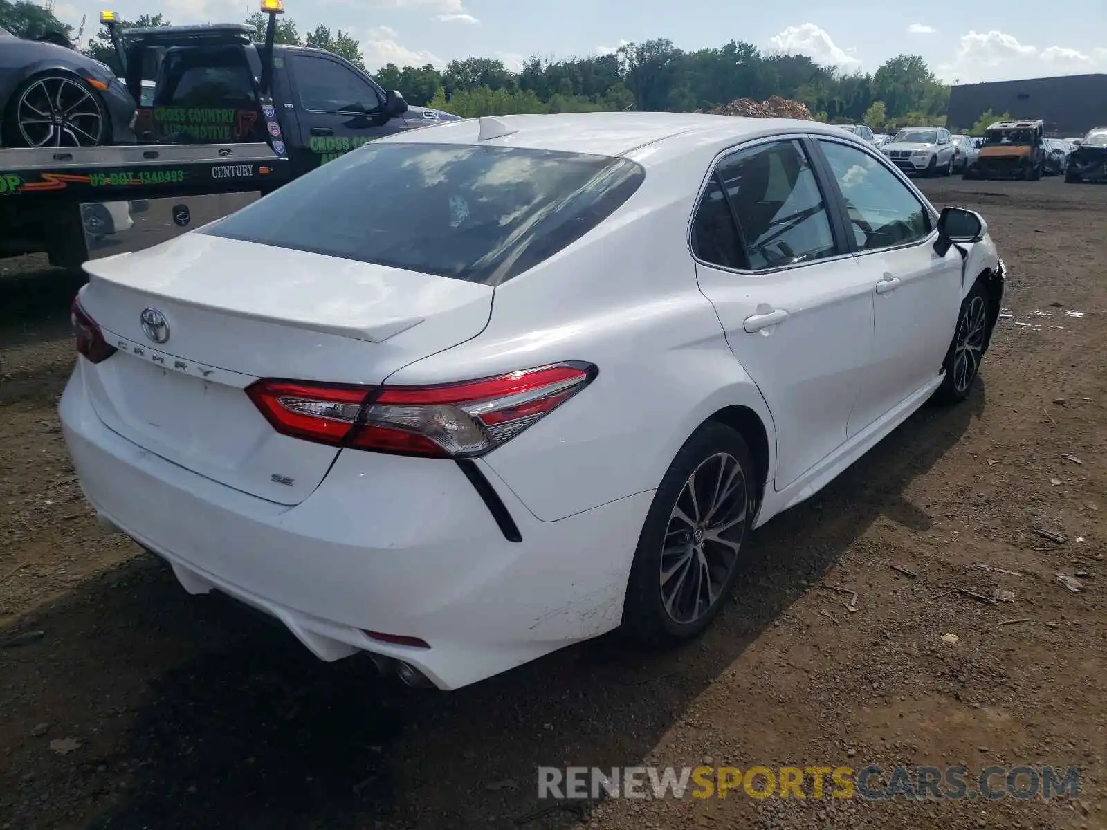 4 Photograph of a damaged car 4T1B11HKXKU750692 TOYOTA CAMRY 2019