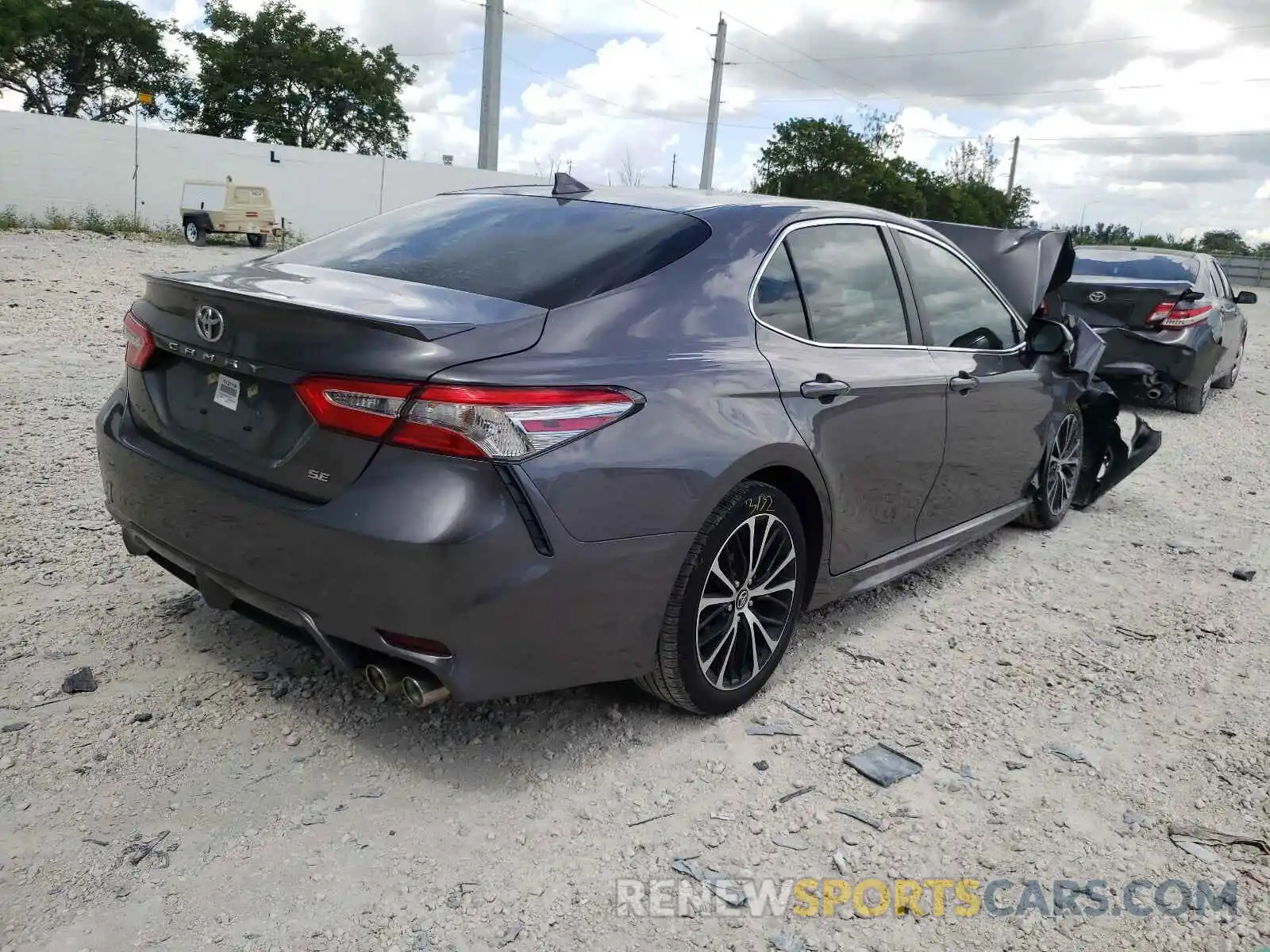 4 Photograph of a damaged car 4T1B11HKXKU752751 TOYOTA CAMRY 2019