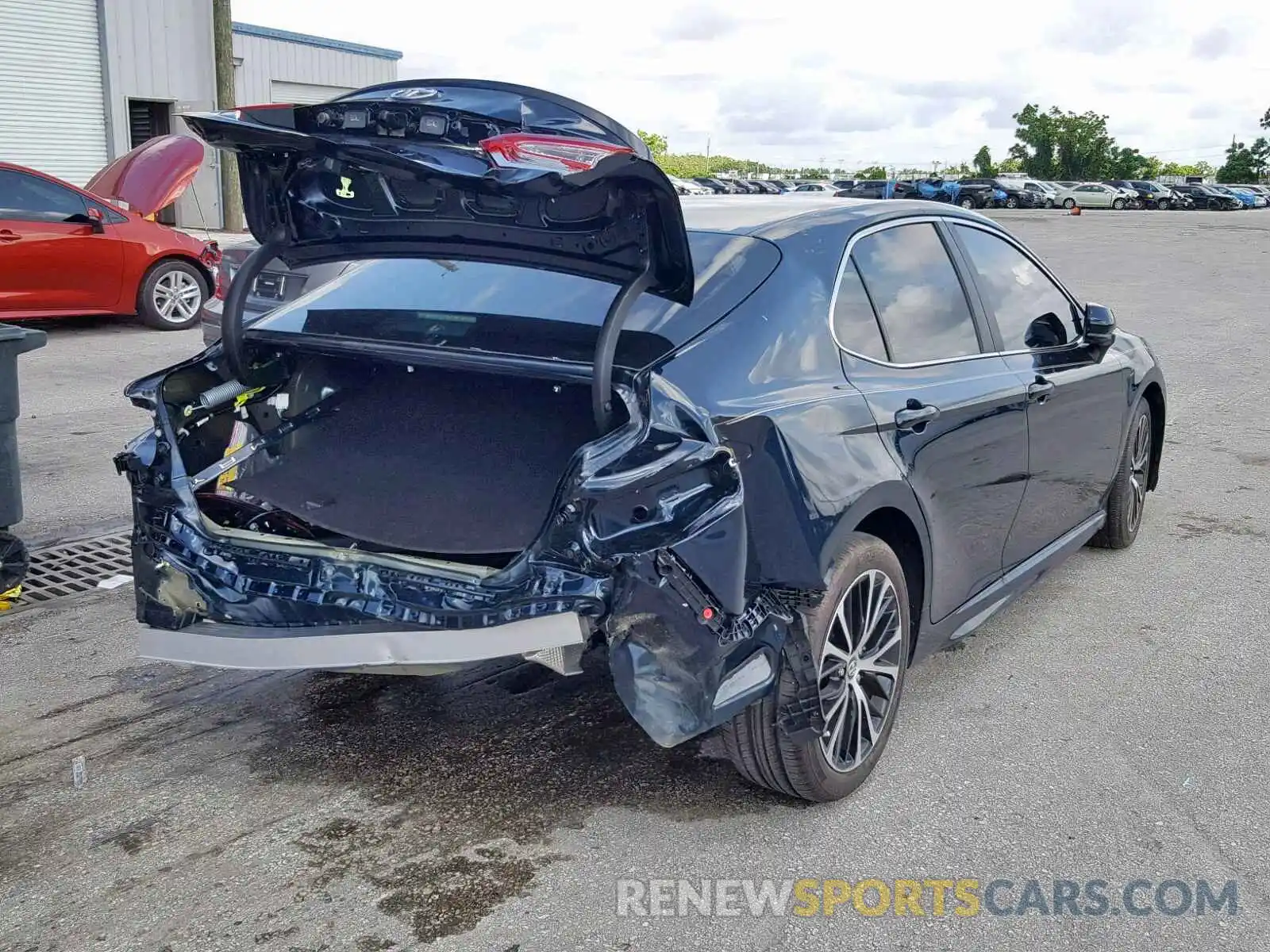 4 Photograph of a damaged car 4T1B11HKXKU753561 TOYOTA CAMRY 2019