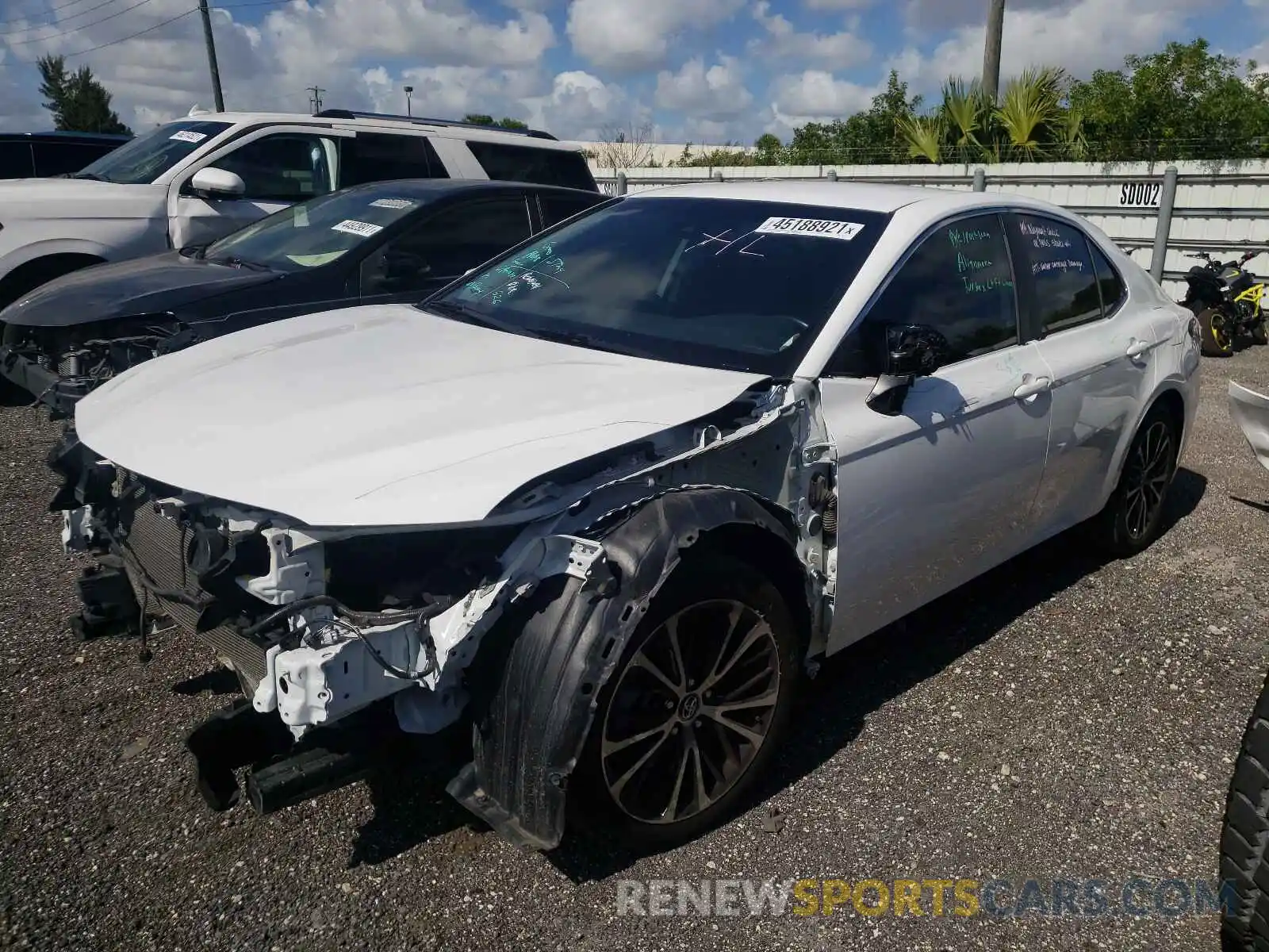 2 Photograph of a damaged car 4T1B11HKXKU754340 TOYOTA CAMRY 2019