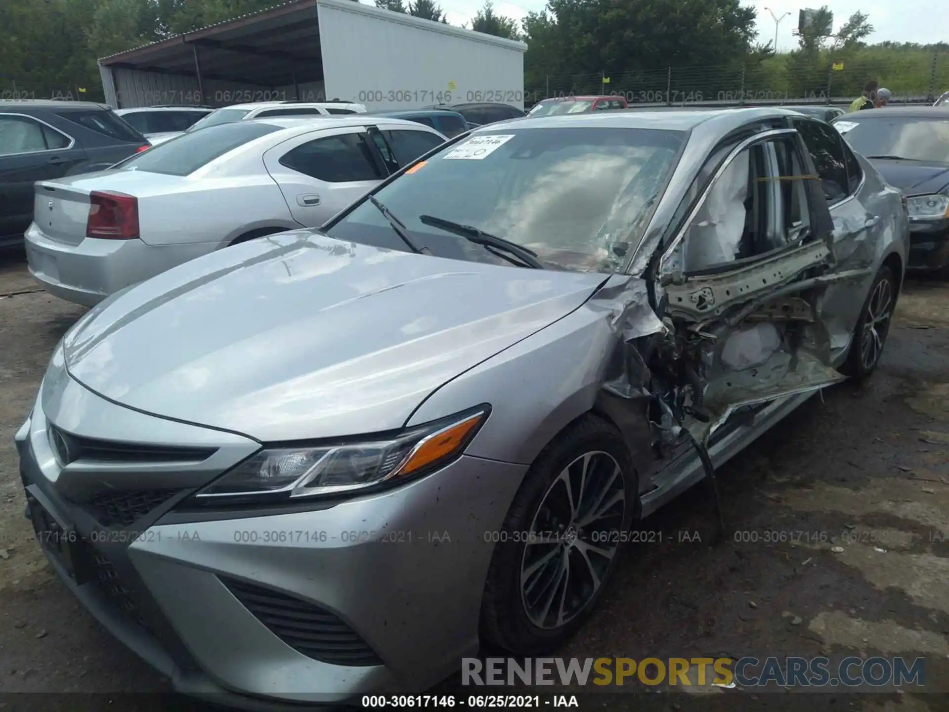 2 Photograph of a damaged car 4T1B11HKXKU754595 TOYOTA CAMRY 2019