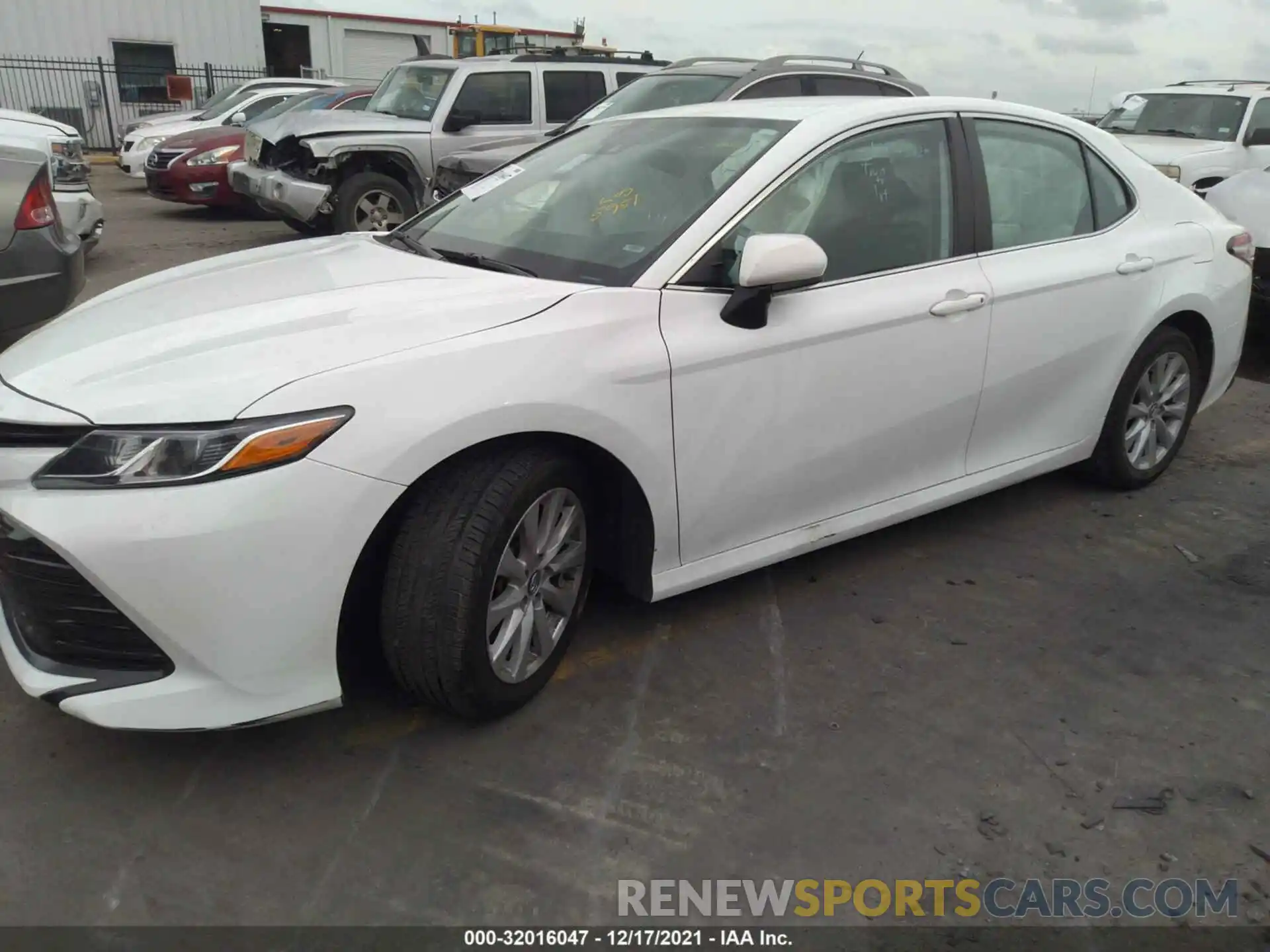 2 Photograph of a damaged car 4T1B11HKXKU754760 TOYOTA CAMRY 2019