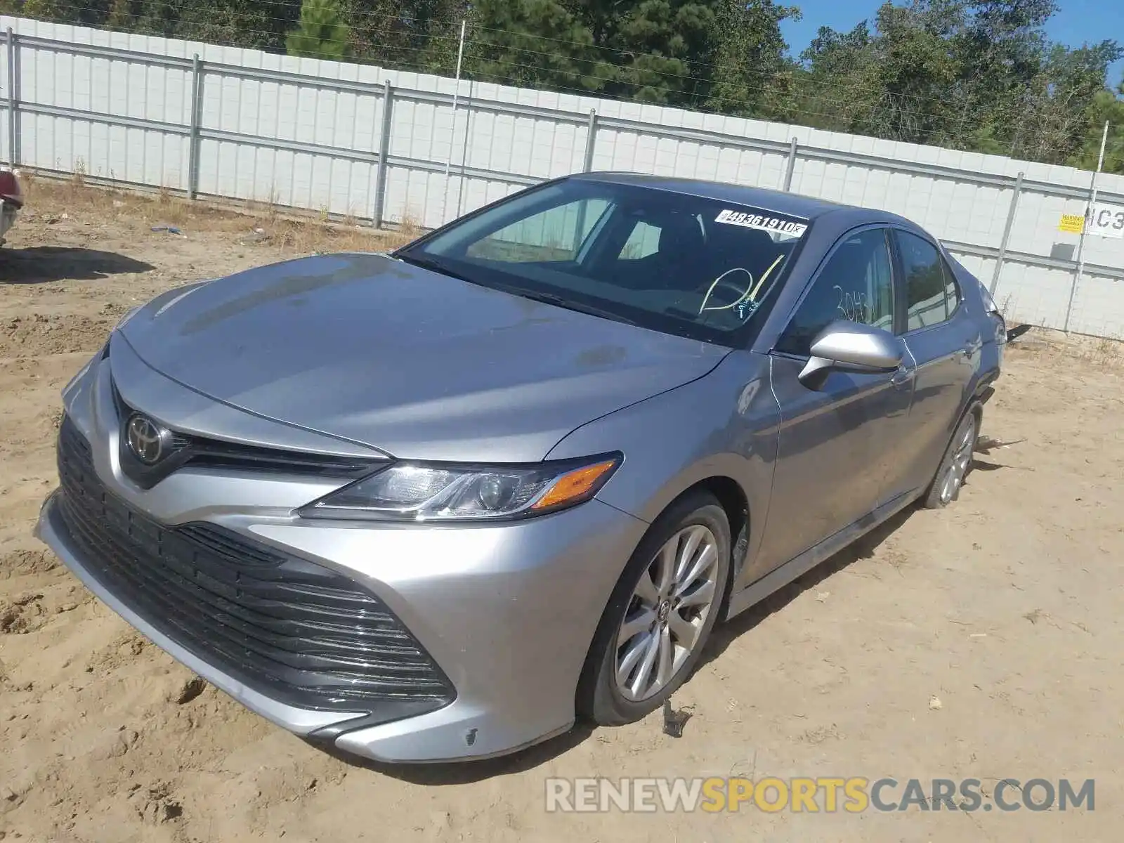 2 Photograph of a damaged car 4T1B11HKXKU756668 TOYOTA CAMRY 2019