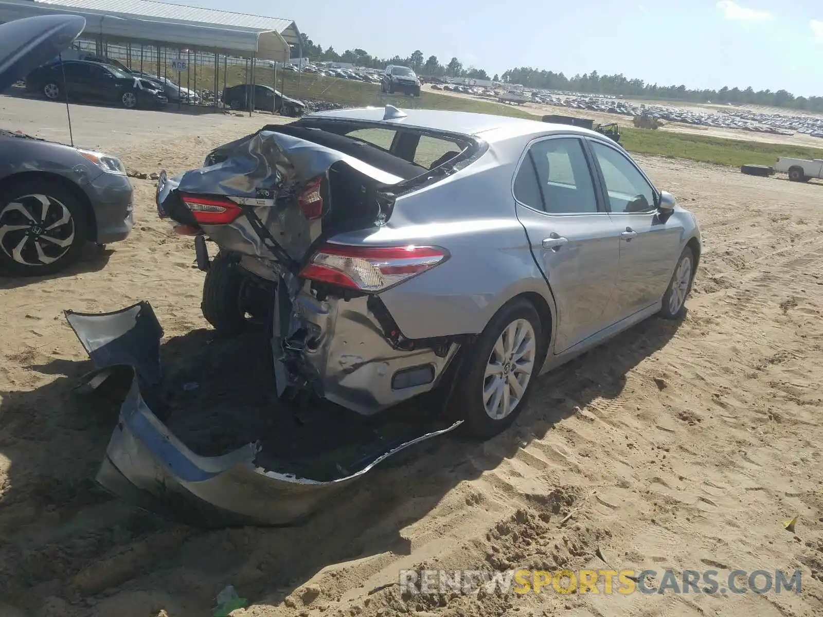 4 Photograph of a damaged car 4T1B11HKXKU756668 TOYOTA CAMRY 2019