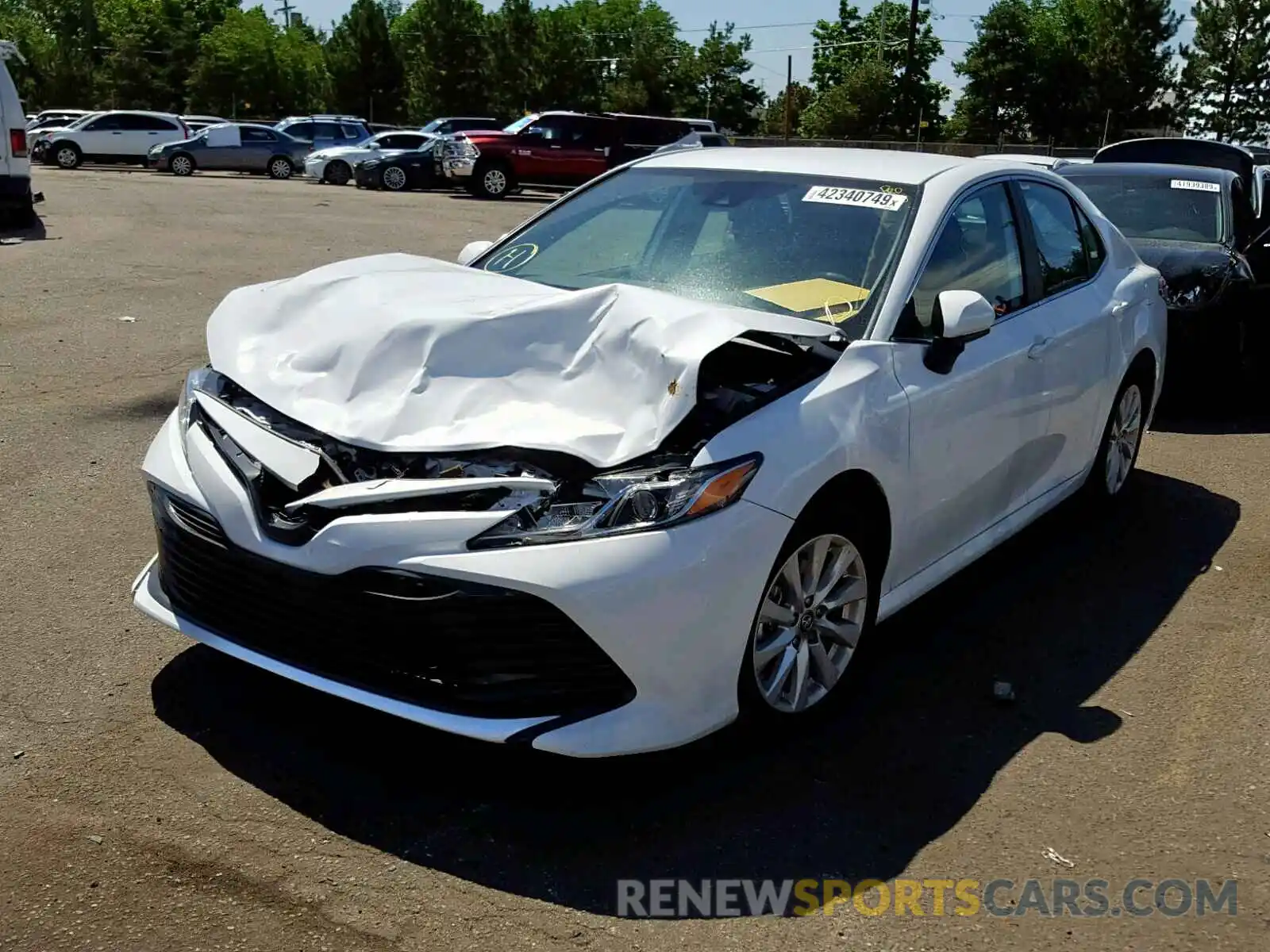 2 Photograph of a damaged car 4T1B11HKXKU757576 TOYOTA CAMRY 2019