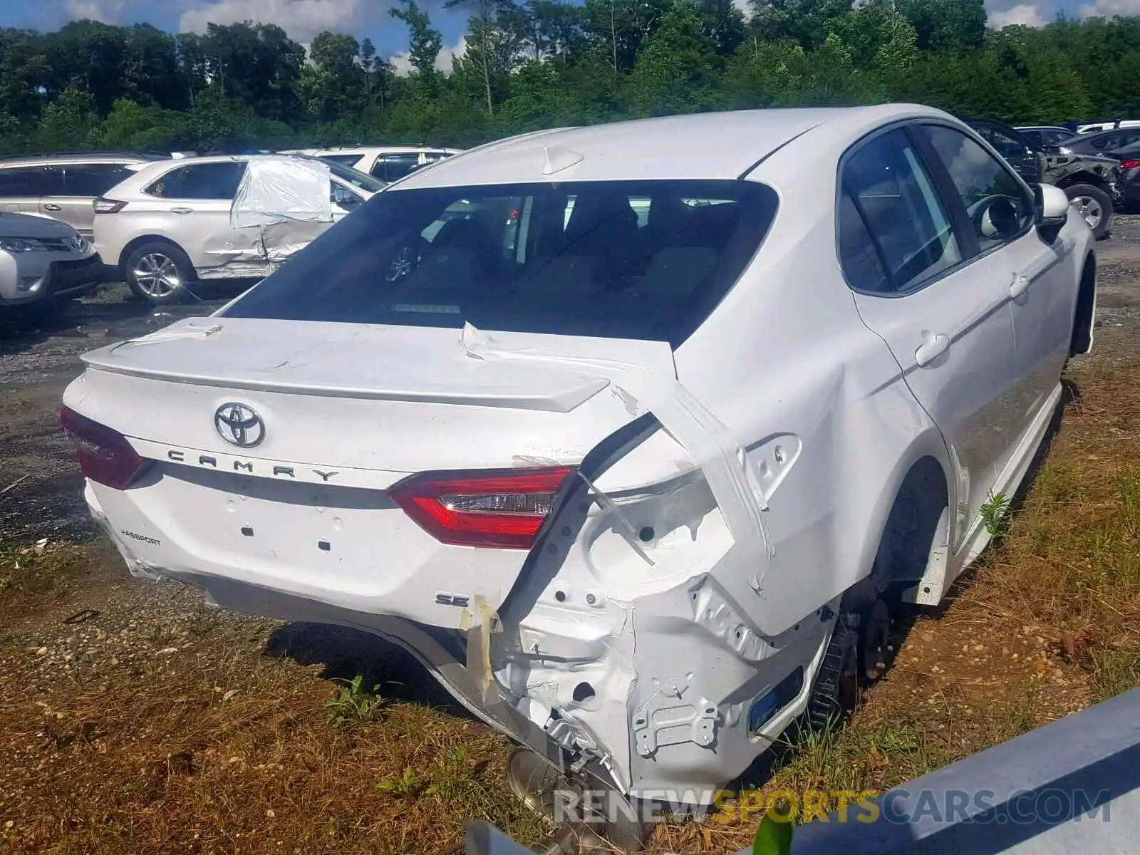 4 Photograph of a damaged car 4T1B11HKXKU761062 TOYOTA CAMRY 2019