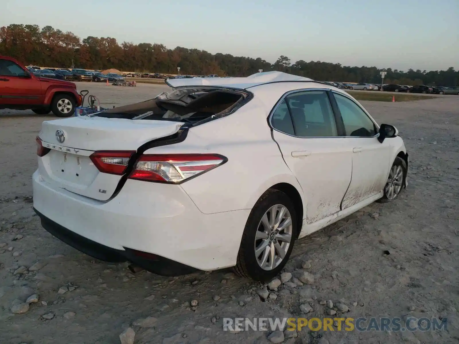 4 Photograph of a damaged car 4T1B11HKXKU761224 TOYOTA CAMRY 2019