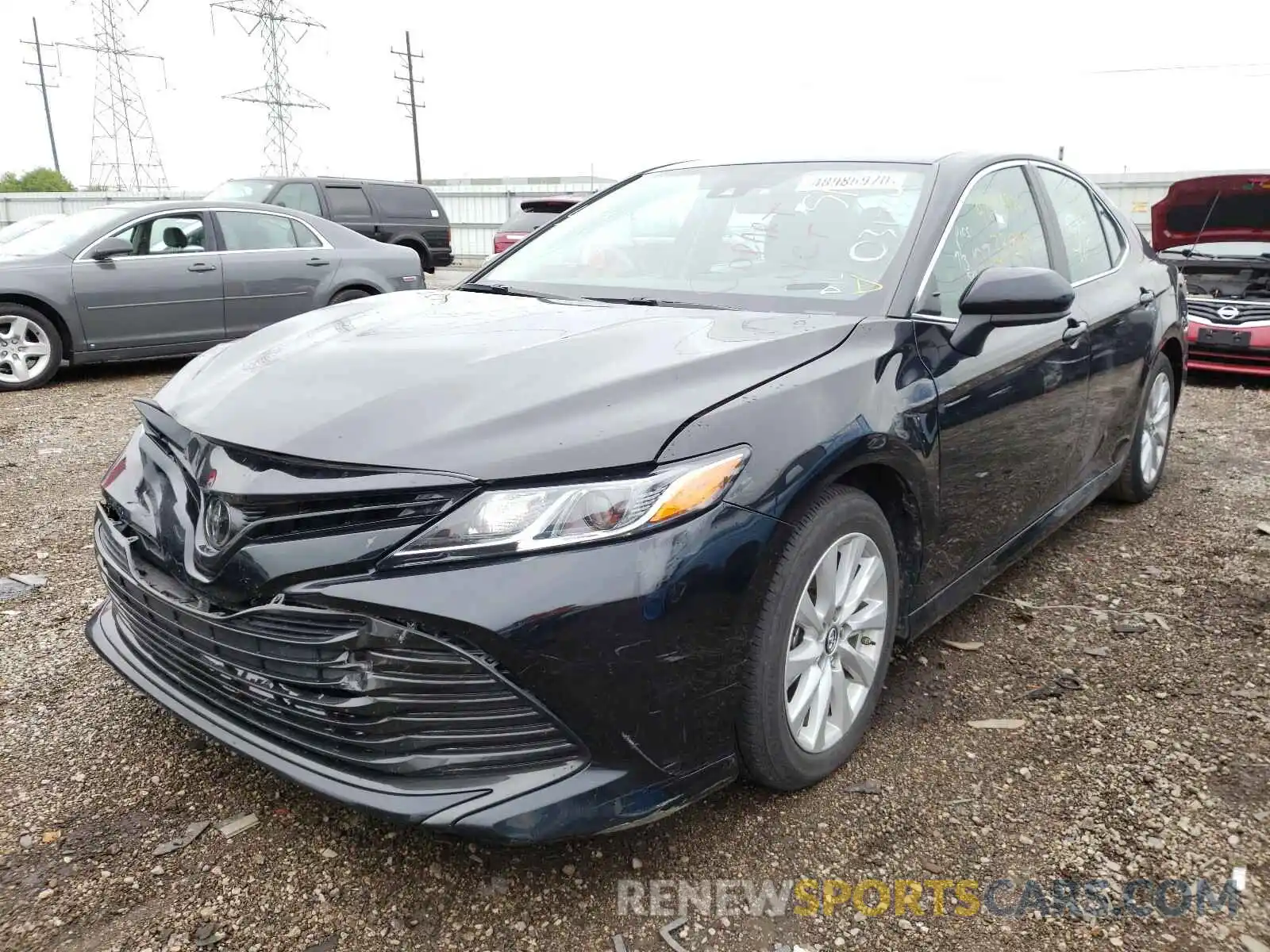 2 Photograph of a damaged car 4T1B11HKXKU765323 TOYOTA CAMRY 2019