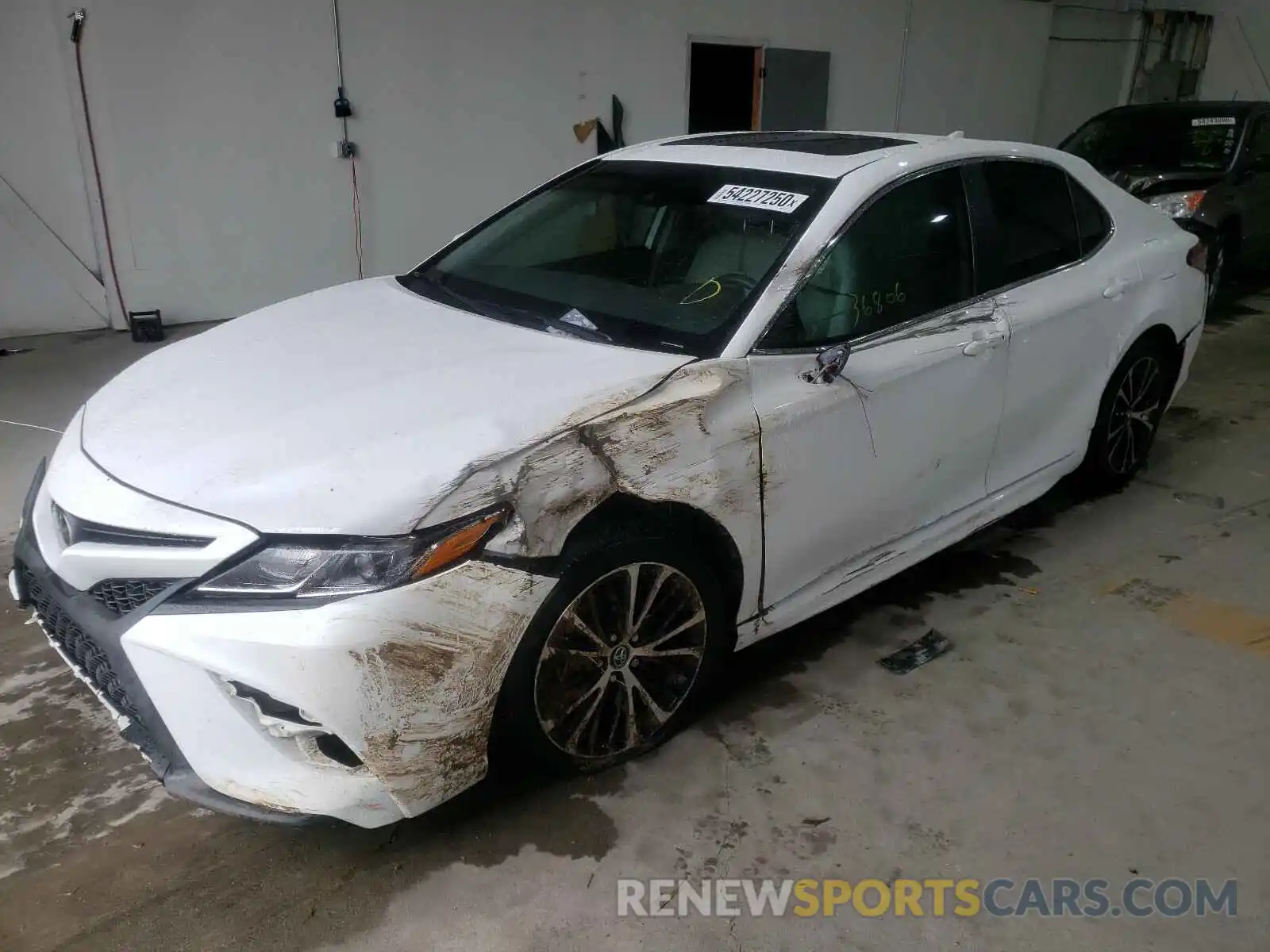 2 Photograph of a damaged car 4T1B11HKXKU769095 TOYOTA CAMRY 2019