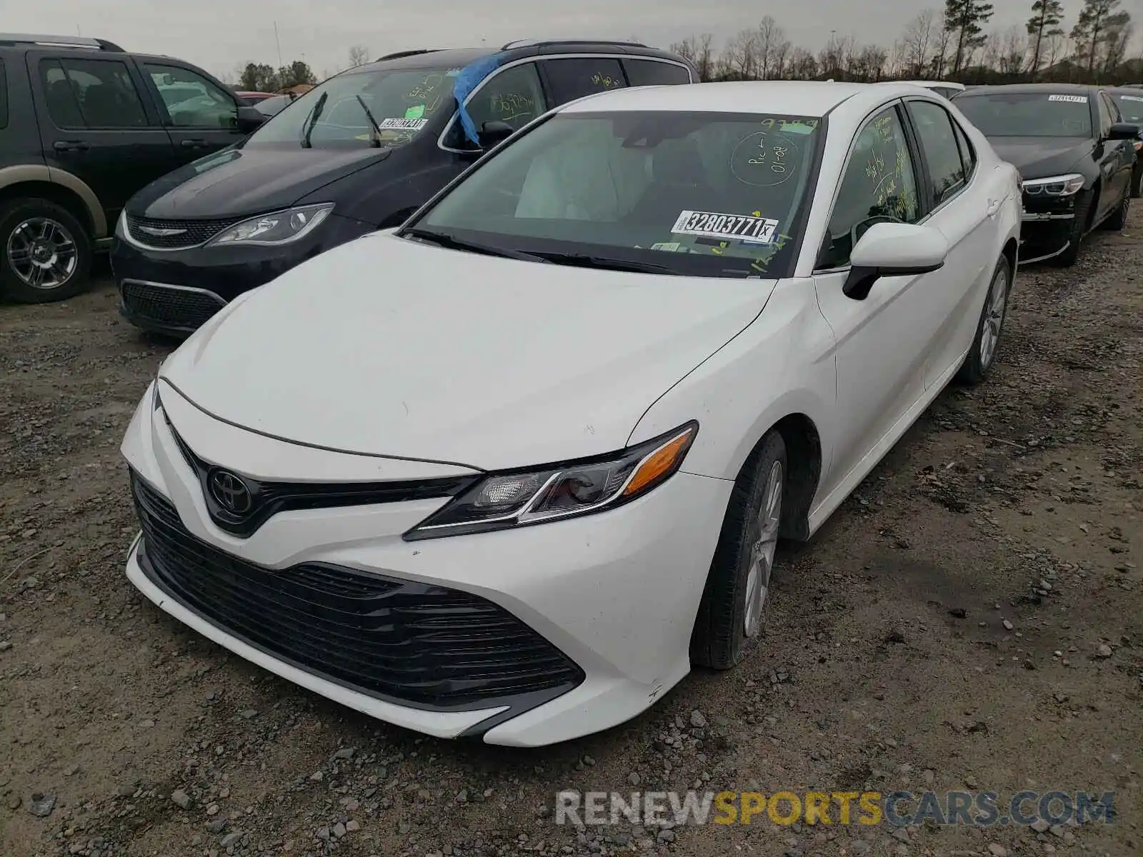 2 Photograph of a damaged car 4T1B11HKXKU769789 TOYOTA CAMRY 2019