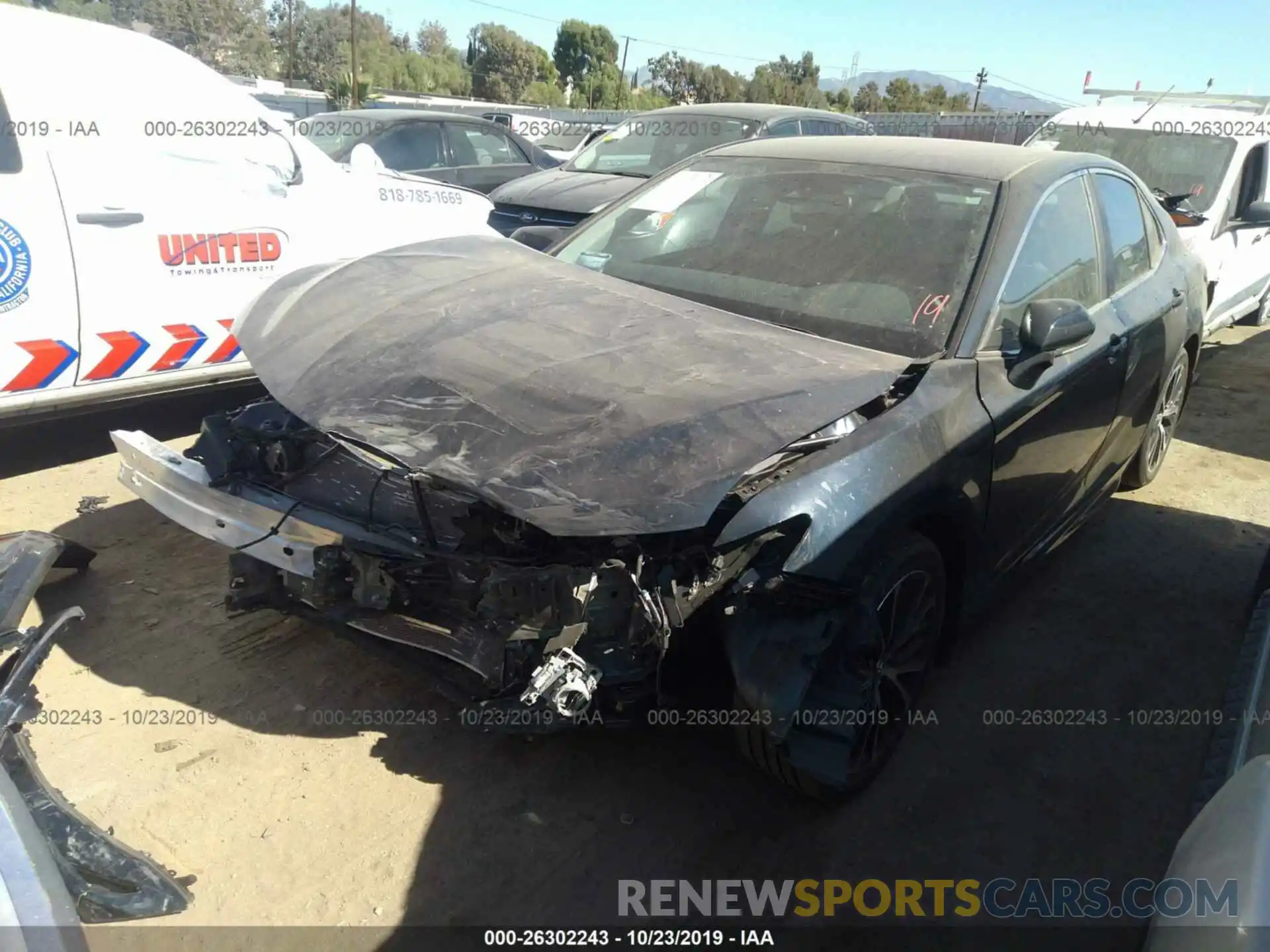 2 Photograph of a damaged car 4T1B11HKXKU771624 TOYOTA CAMRY 2019