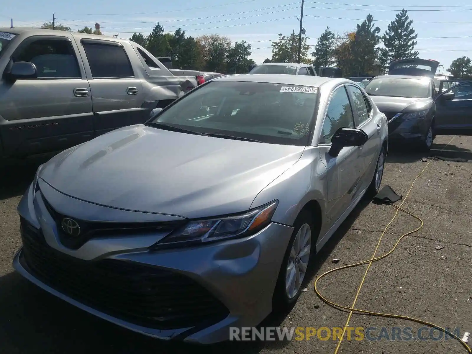 2 Photograph of a damaged car 4T1B11HKXKU772451 TOYOTA CAMRY 2019