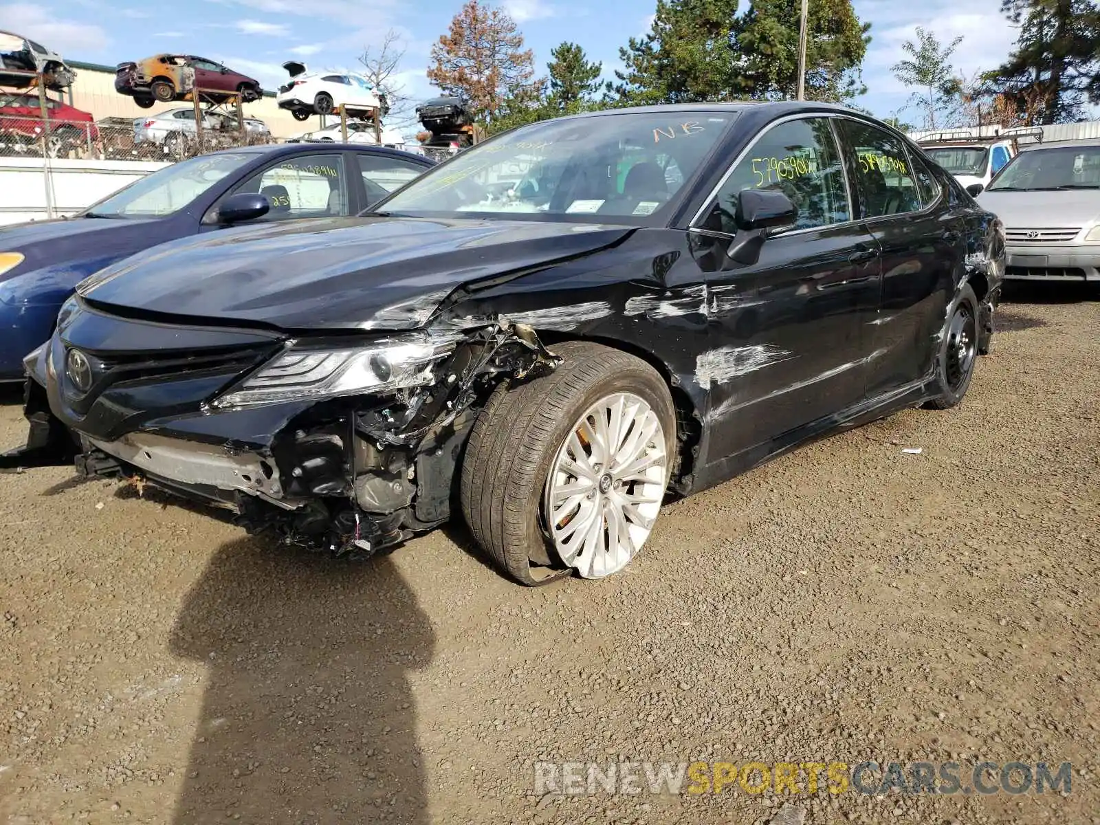 2 Photograph of a damaged car 4T1B11HKXKU784020 TOYOTA CAMRY 2019