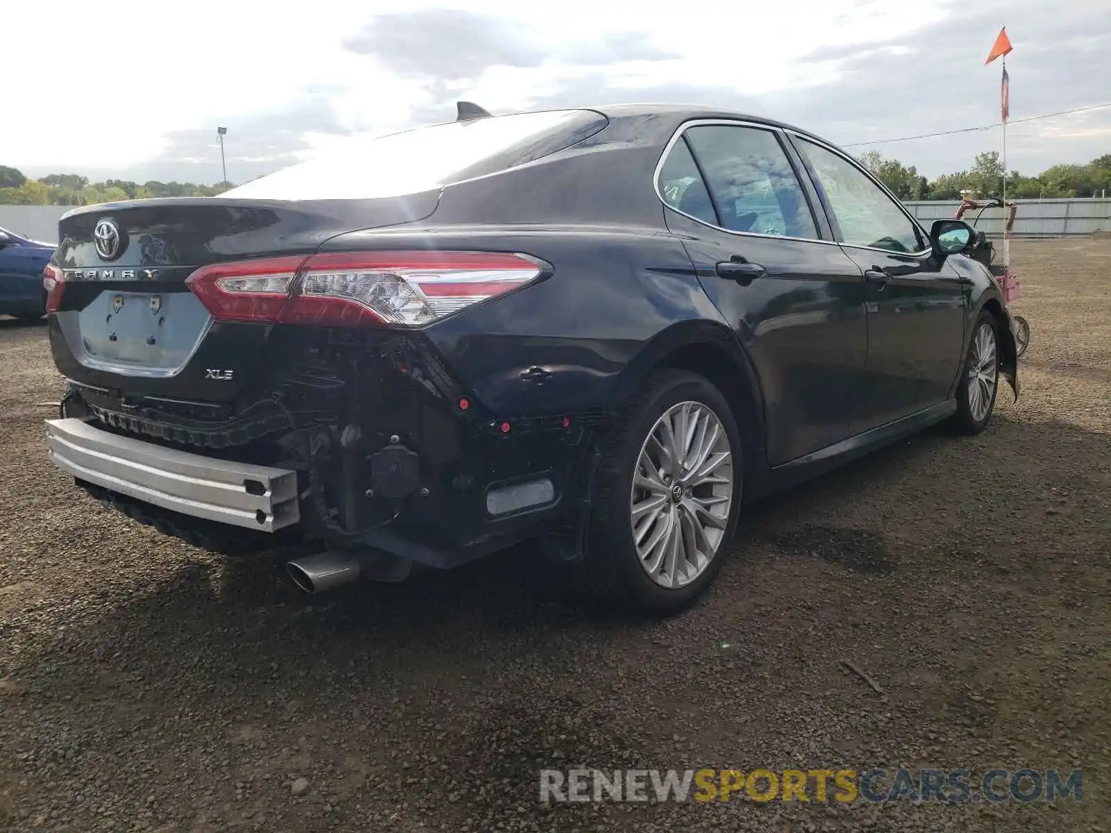 4 Photograph of a damaged car 4T1B11HKXKU784020 TOYOTA CAMRY 2019