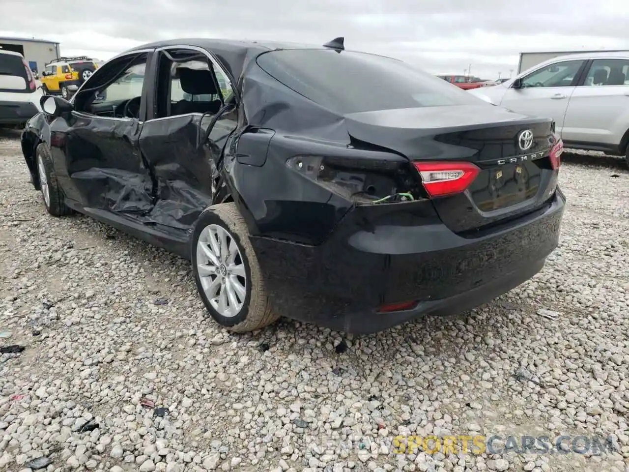 3 Photograph of a damaged car 4T1B11HKXKU785605 TOYOTA CAMRY 2019