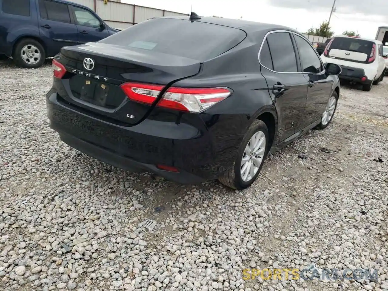 4 Photograph of a damaged car 4T1B11HKXKU785605 TOYOTA CAMRY 2019