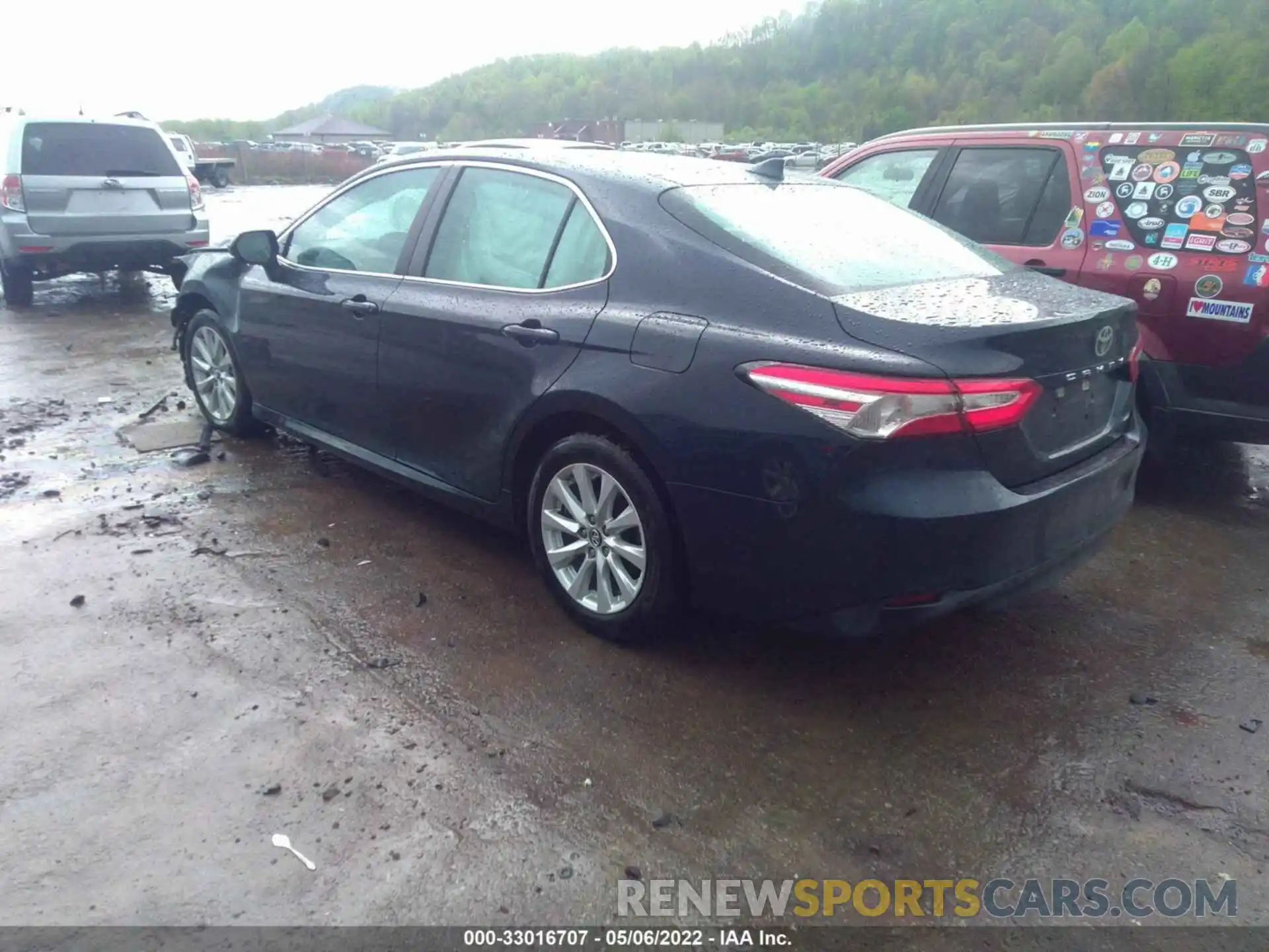 3 Photograph of a damaged car 4T1B11HKXKU785944 TOYOTA CAMRY 2019