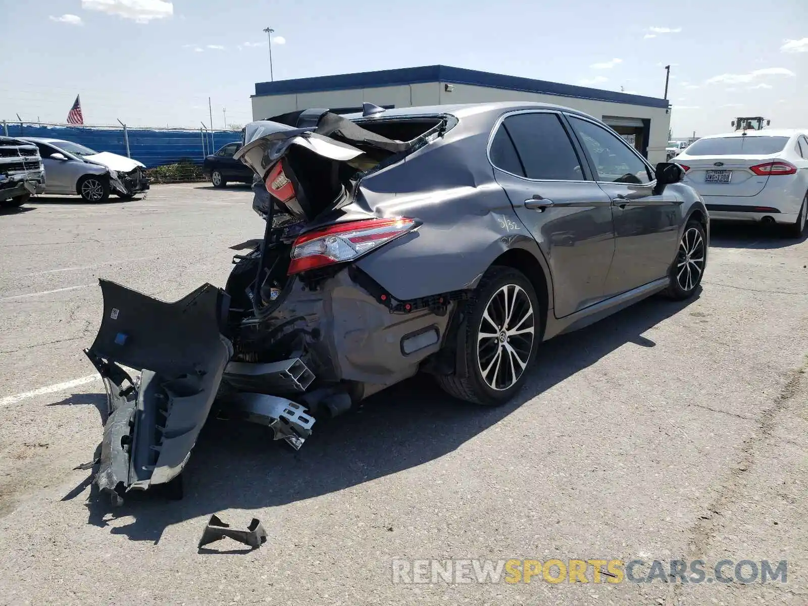 4 Photograph of a damaged car 4T1B11HKXKU787239 TOYOTA CAMRY 2019