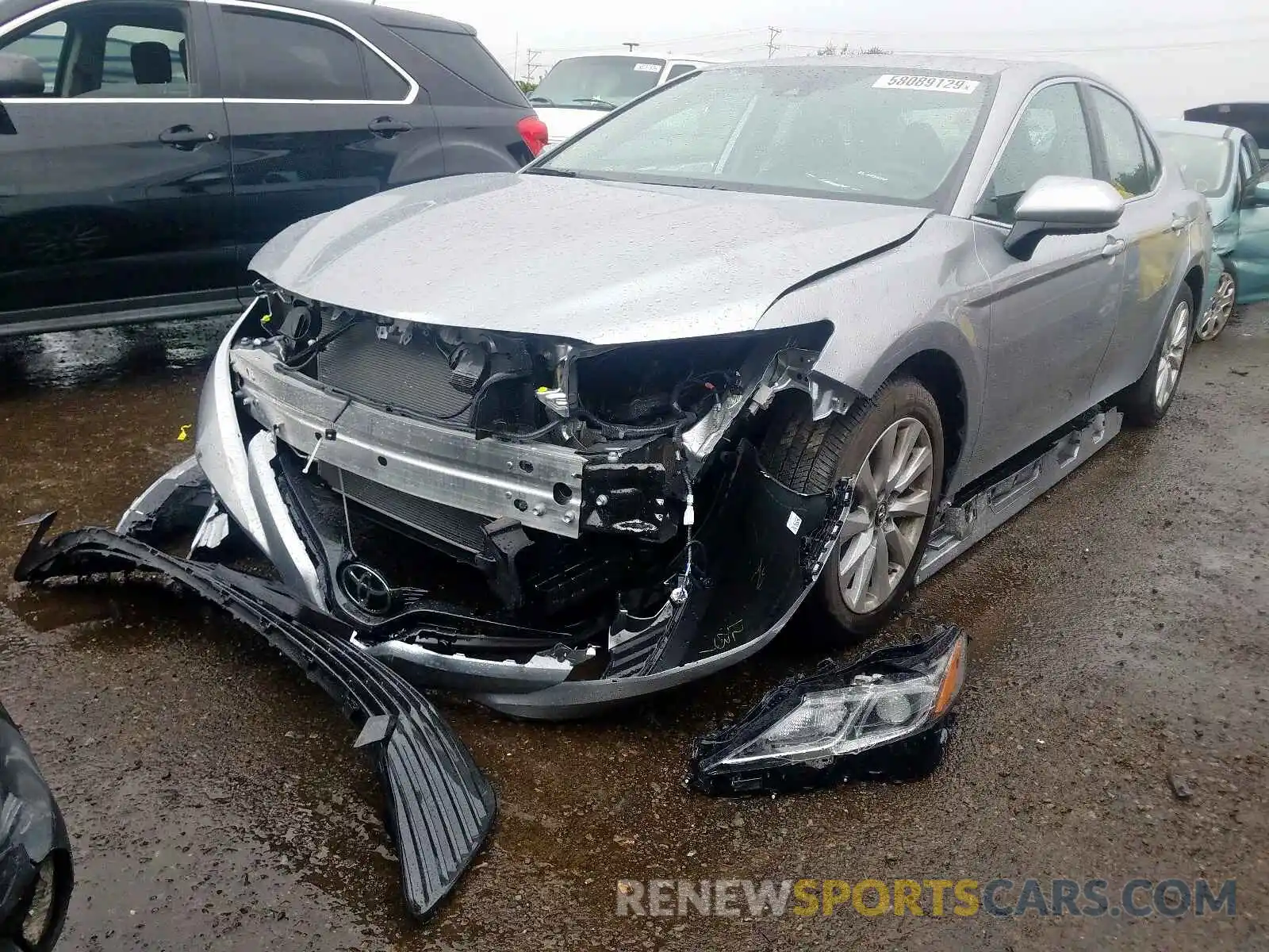 2 Photograph of a damaged car 4T1B11HKXKU793901 TOYOTA CAMRY 2019