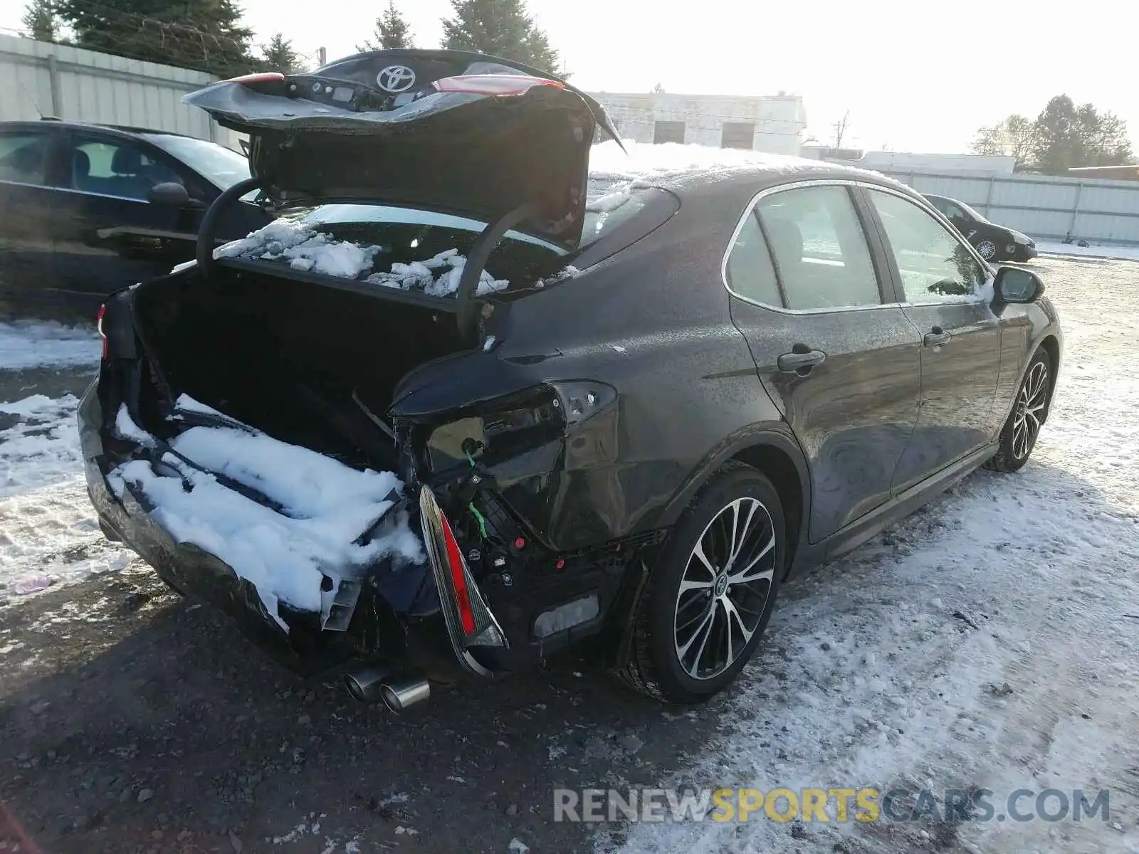 4 Photograph of a damaged car 4T1B11HKXKU797768 TOYOTA CAMRY 2019