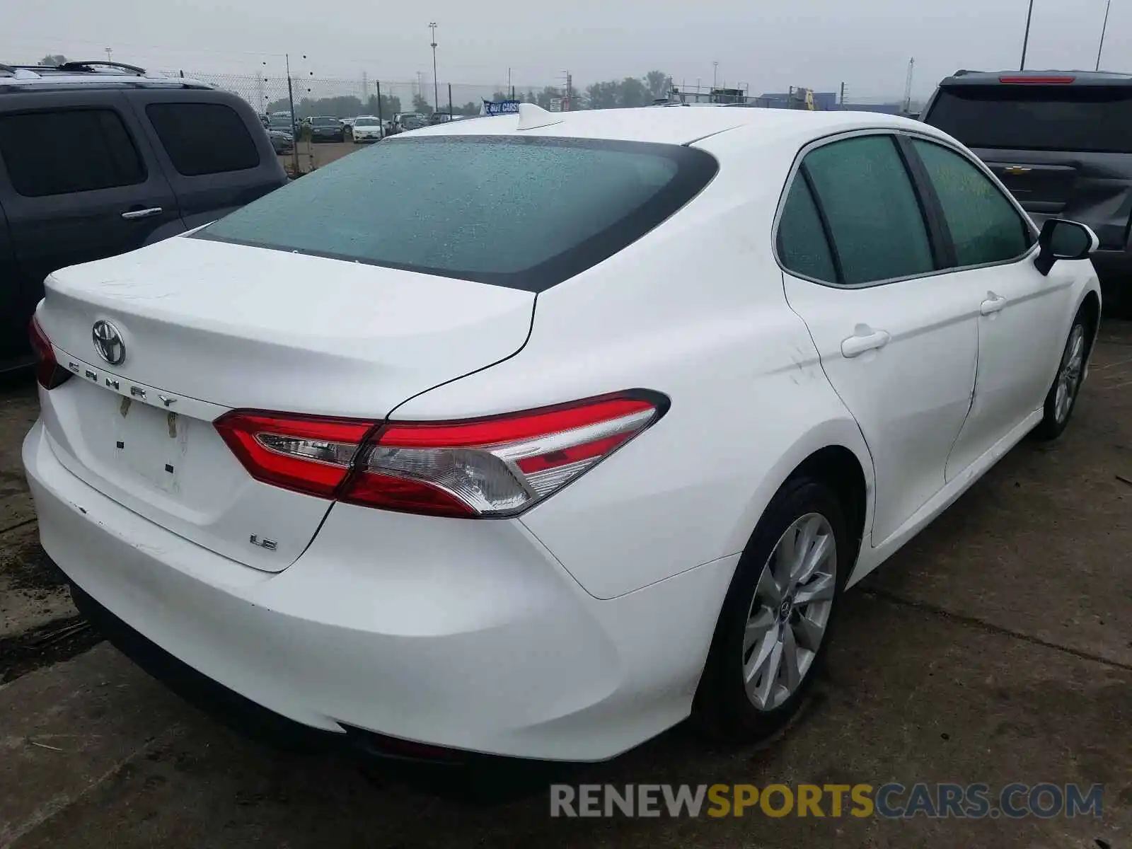 4 Photograph of a damaged car 4T1B11HKXKU801690 TOYOTA CAMRY 2019