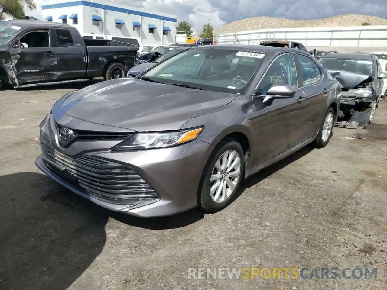 2 Photograph of a damaged car 4T1B11HKXKU801964 TOYOTA CAMRY 2019