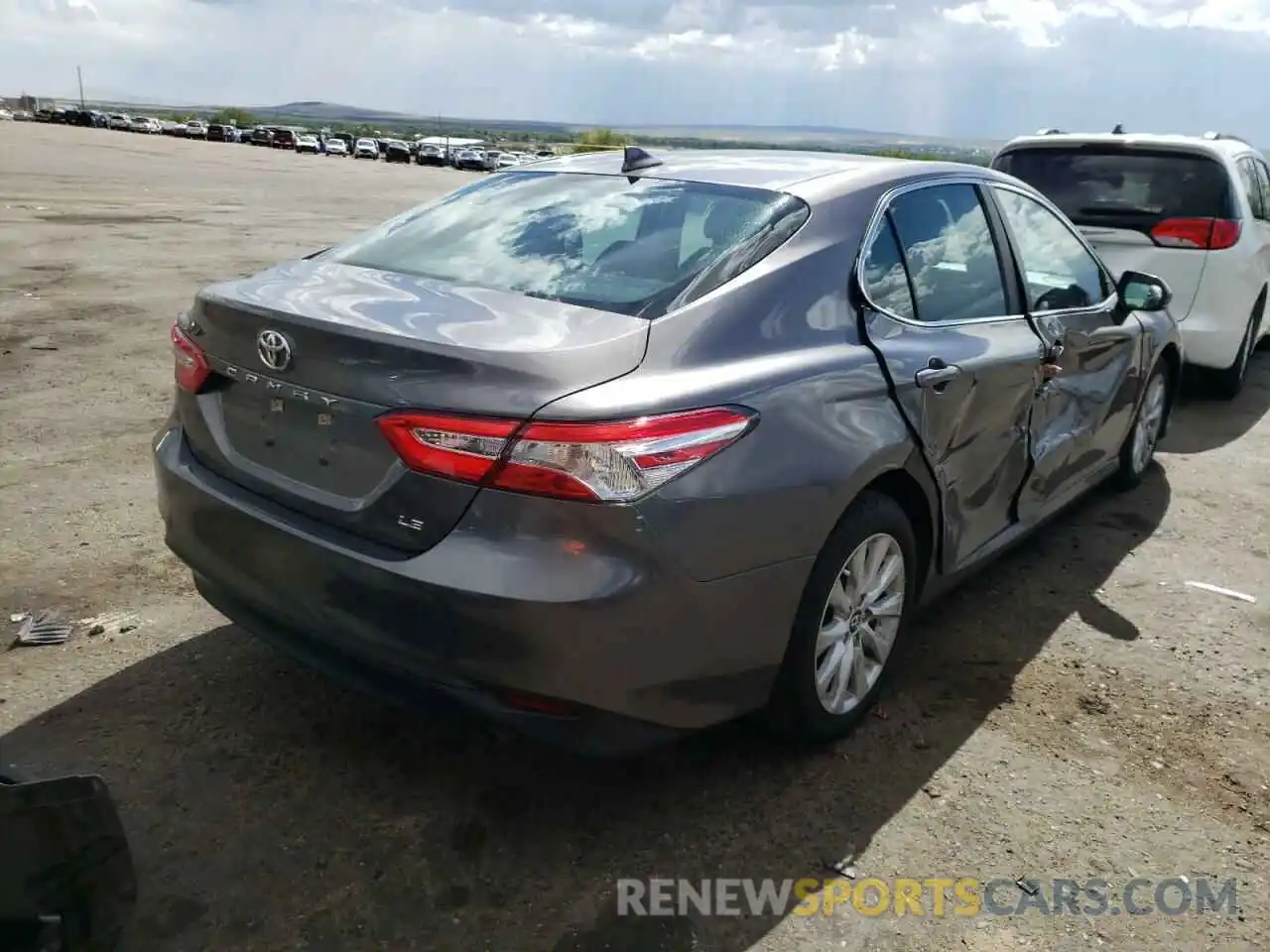 4 Photograph of a damaged car 4T1B11HKXKU801964 TOYOTA CAMRY 2019