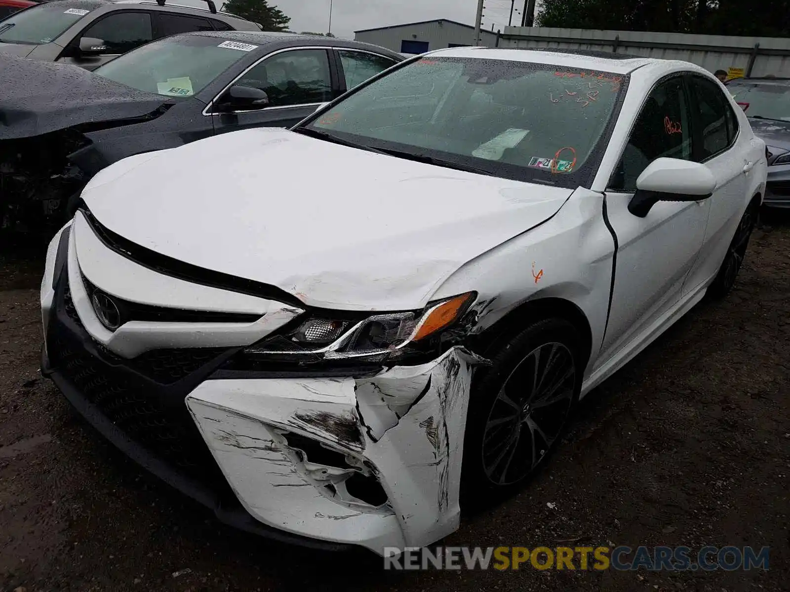 2 Photograph of a damaged car 4T1B11HKXKU806162 TOYOTA CAMRY 2019