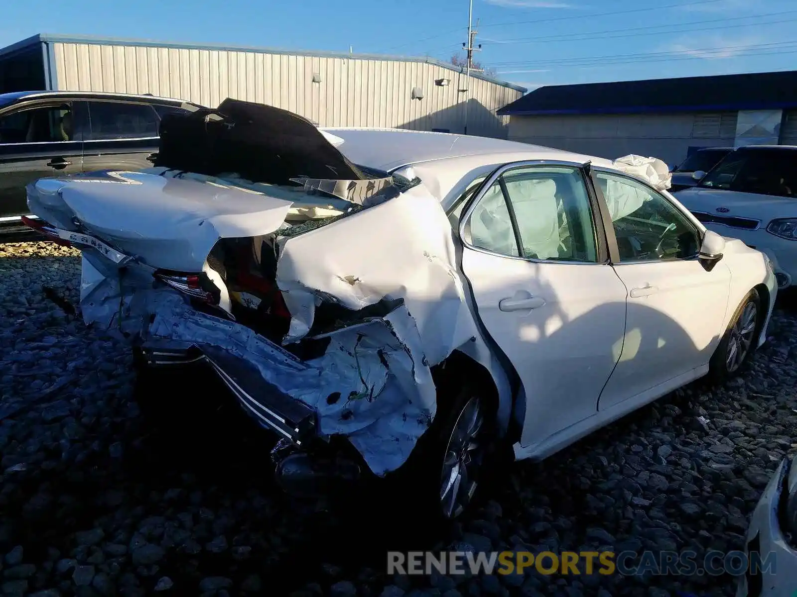 4 Photograph of a damaged car 4T1B11HKXKU807103 TOYOTA CAMRY 2019