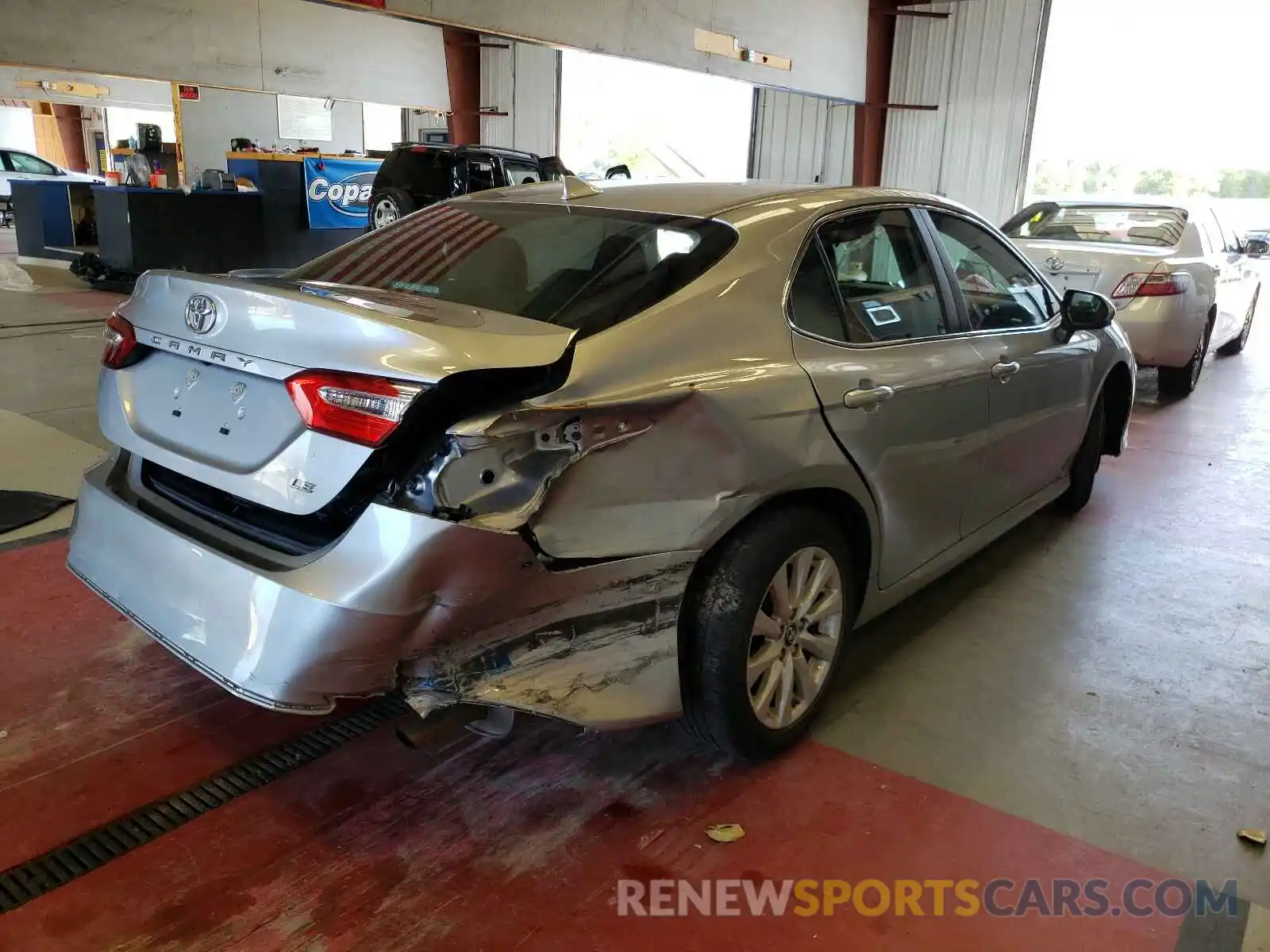 4 Photograph of a damaged car 4T1B11HKXKU807540 TOYOTA CAMRY 2019