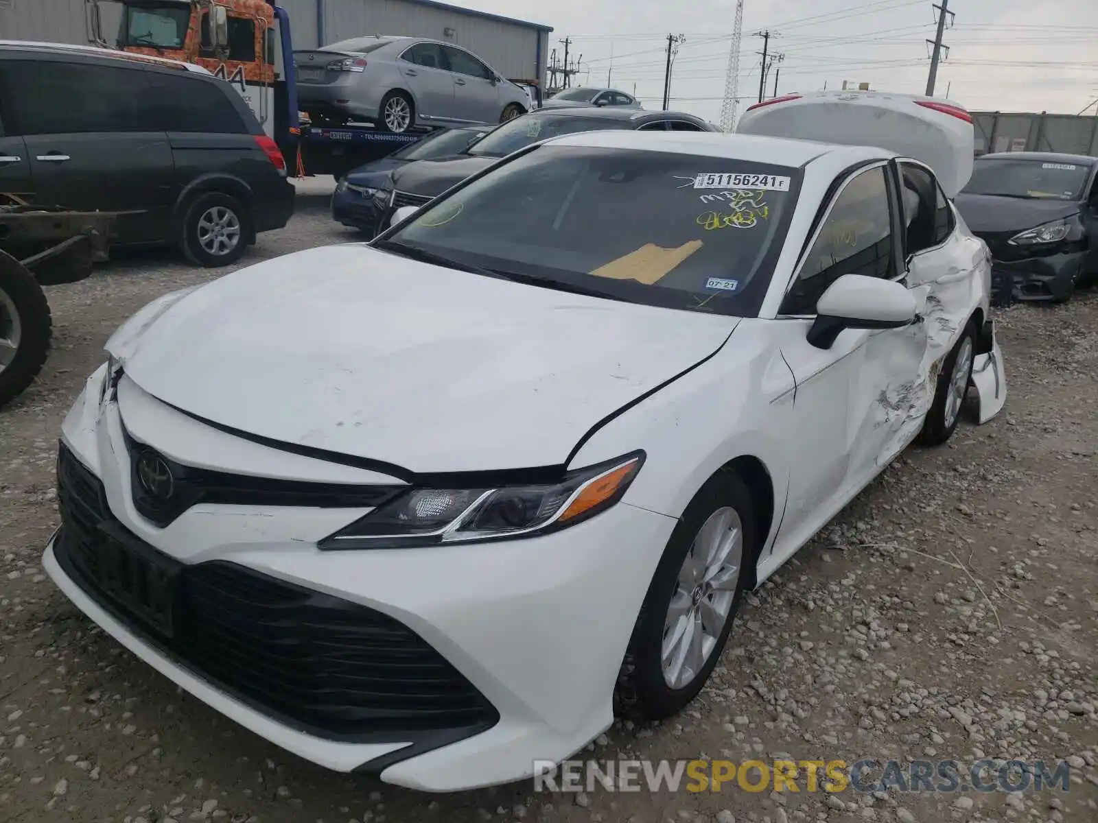 2 Photograph of a damaged car 4T1B11HKXKU810924 TOYOTA CAMRY 2019