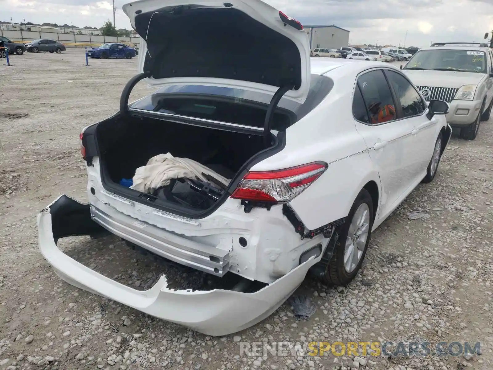 4 Photograph of a damaged car 4T1B11HKXKU810924 TOYOTA CAMRY 2019