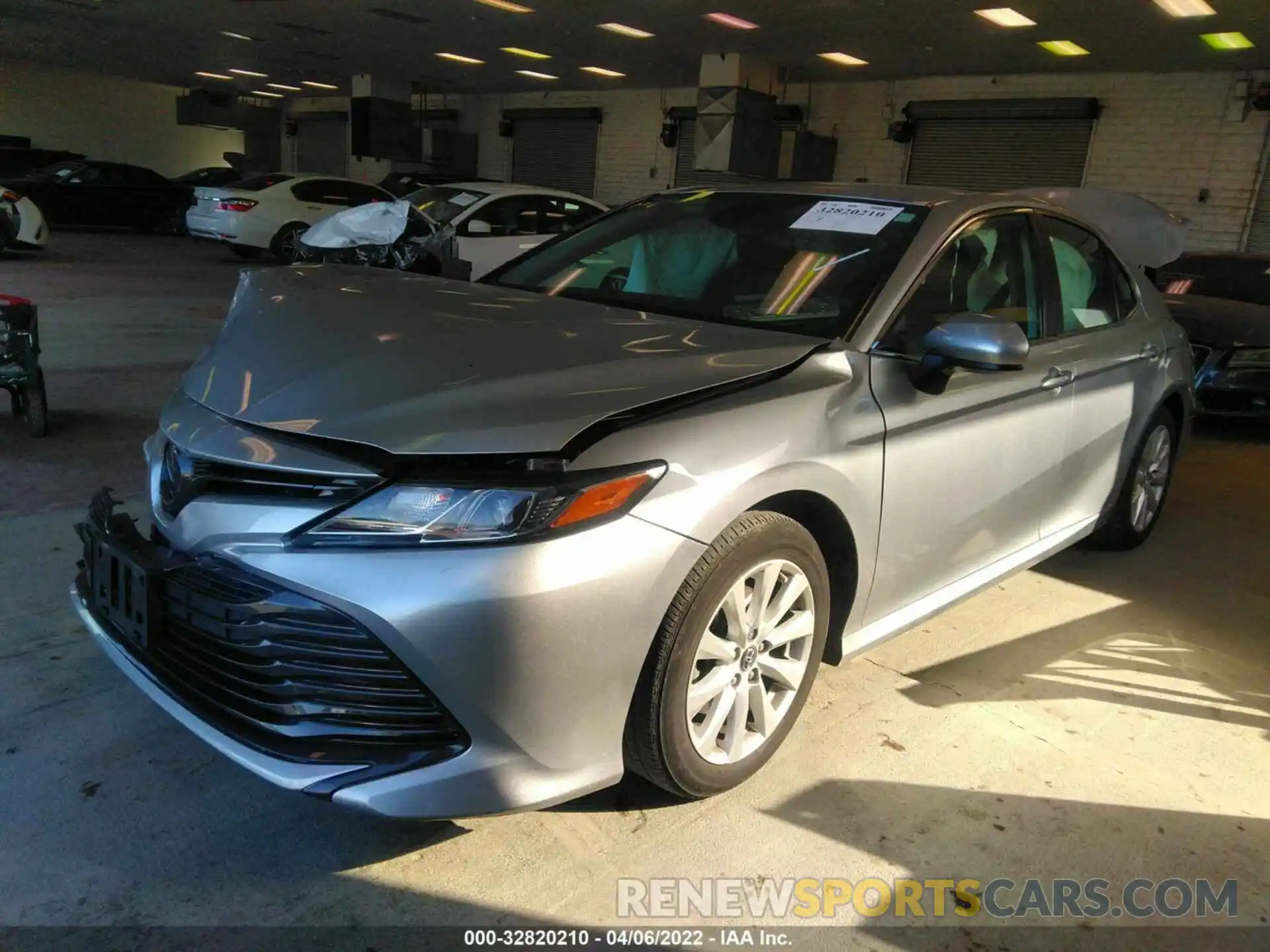 2 Photograph of a damaged car 4T1B11HKXKU813113 TOYOTA CAMRY 2019