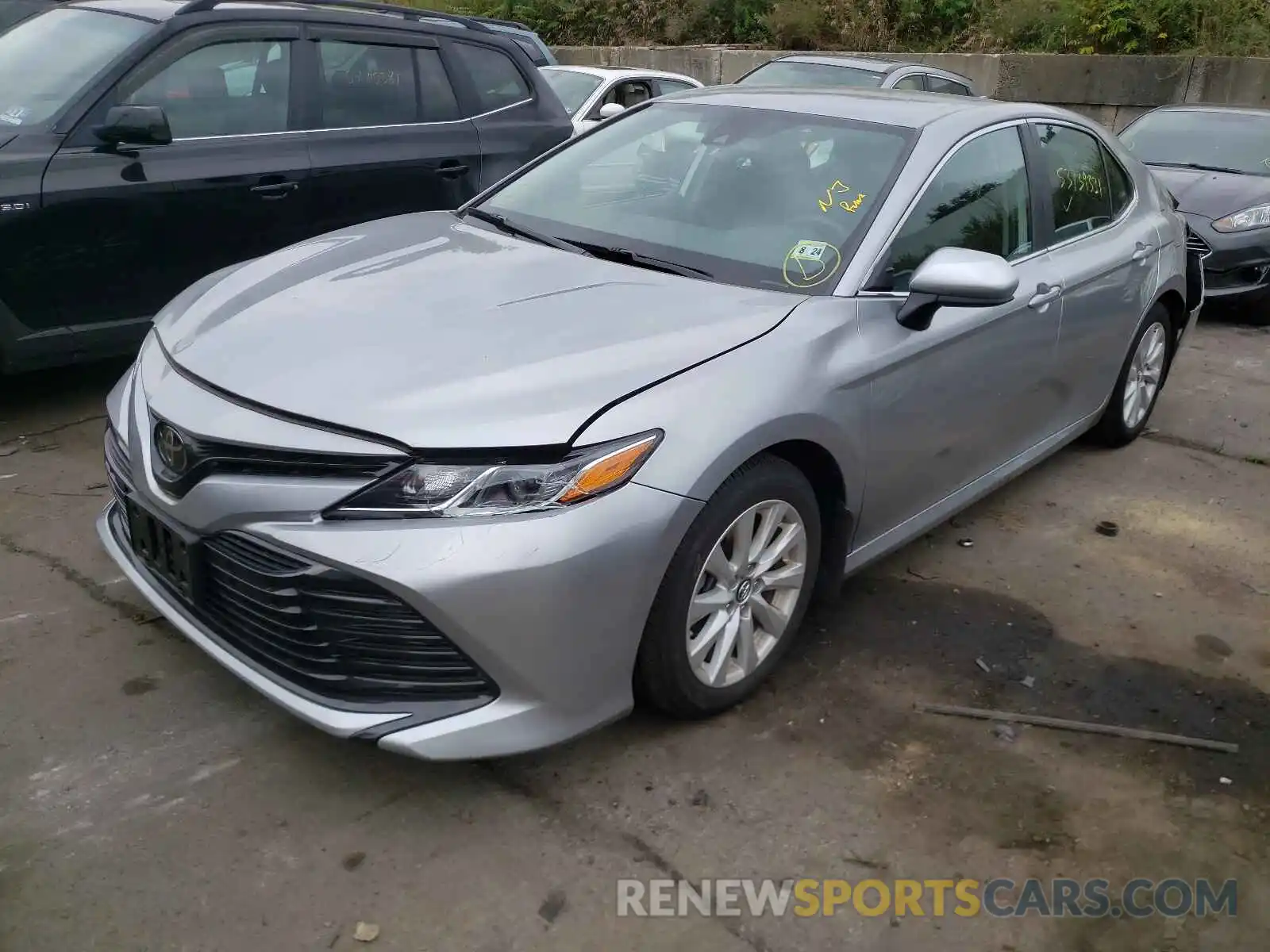 2 Photograph of a damaged car 4T1B11HKXKU821616 TOYOTA CAMRY 2019