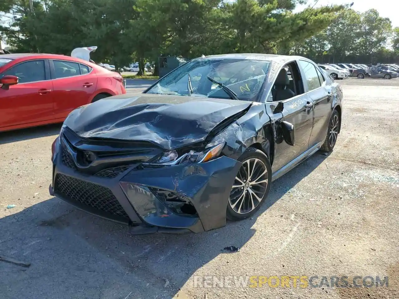 2 Photograph of a damaged car 4T1B11HKXKU823348 TOYOTA CAMRY 2019