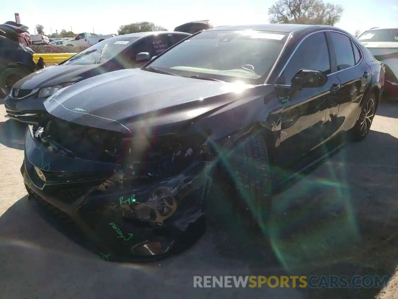 2 Photograph of a damaged car 4T1B11HKXKU825763 TOYOTA CAMRY 2019