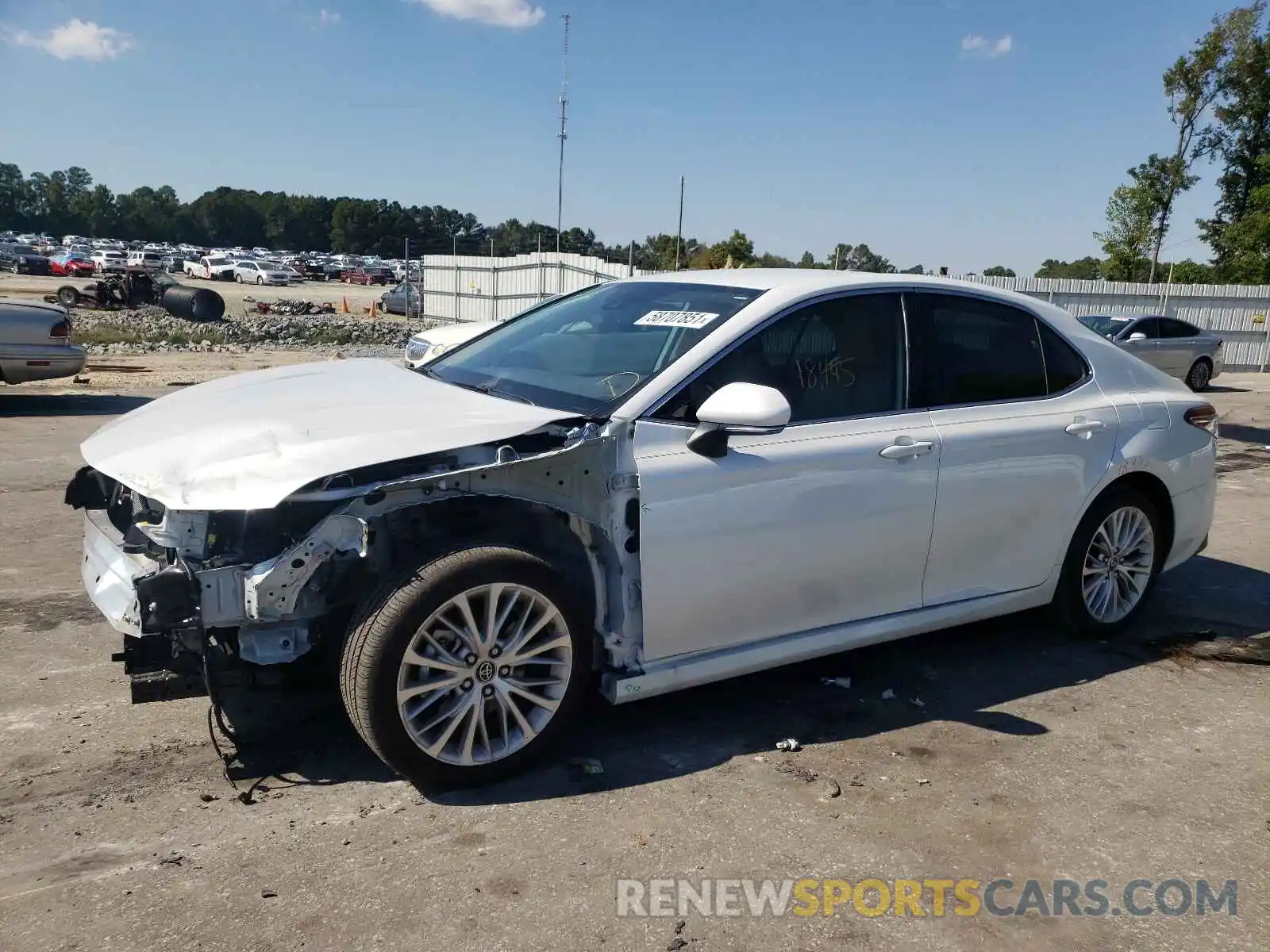 2 Photograph of a damaged car 4T1B11HKXKU831014 TOYOTA CAMRY 2019