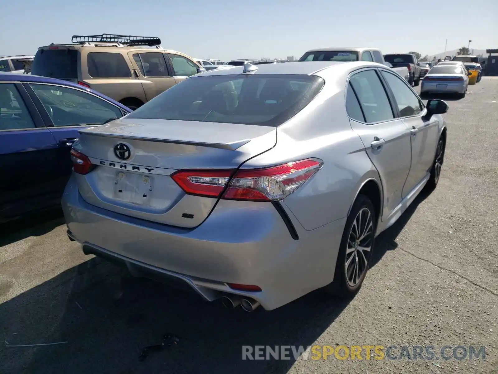 4 Photograph of a damaged car 4T1B11HKXKU831806 TOYOTA CAMRY 2019