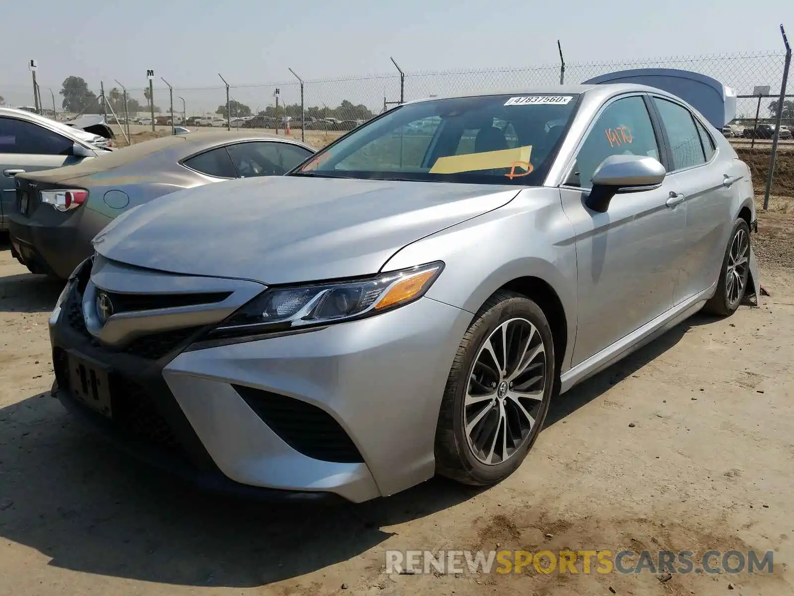 2 Photograph of a damaged car 4T1B11HKXKU834687 TOYOTA CAMRY 2019