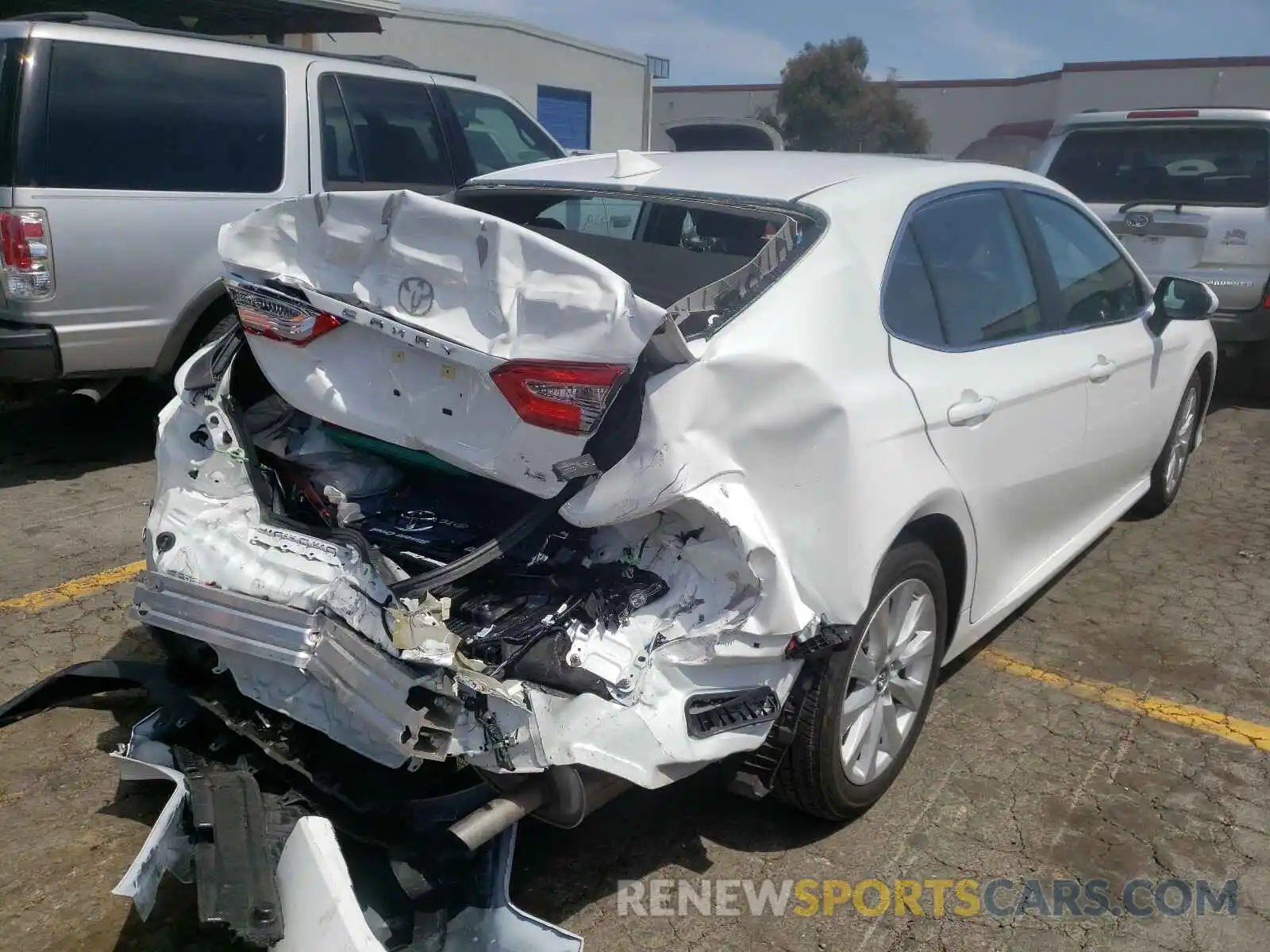 4 Photograph of a damaged car 4T1B11HKXKU836360 TOYOTA CAMRY 2019