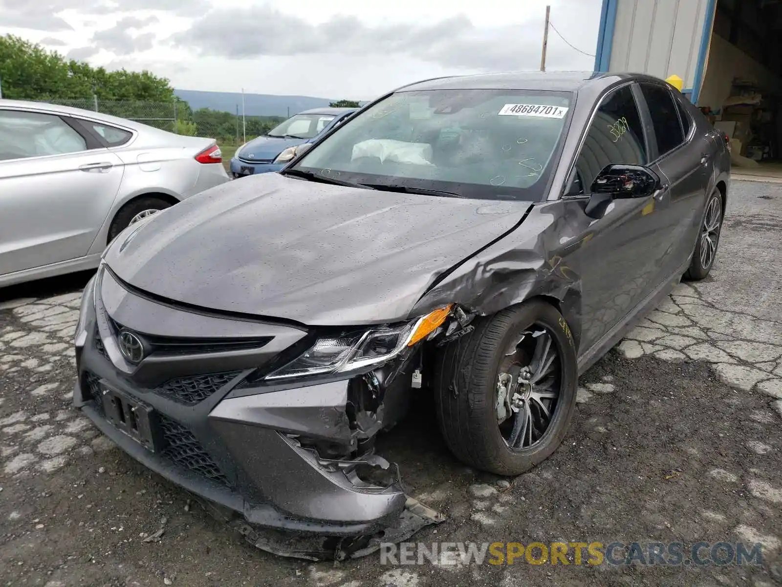 2 Photograph of a damaged car 4T1B11HKXKU856012 TOYOTA CAMRY 2019