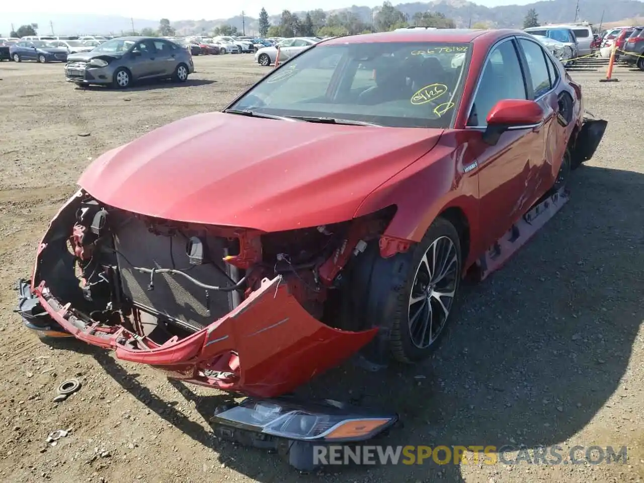 2 Photograph of a damaged car 4T1B21HK0KU010551 TOYOTA CAMRY 2019