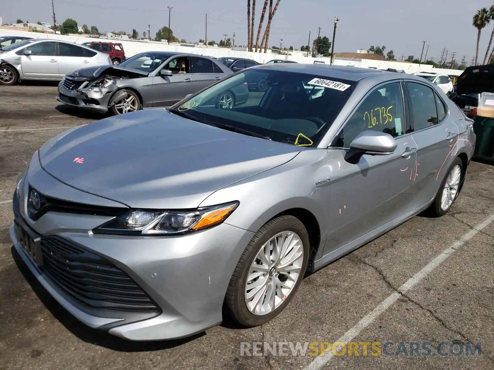 2 Photograph of a damaged car 4T1B21HK0KU010694 TOYOTA CAMRY 2019