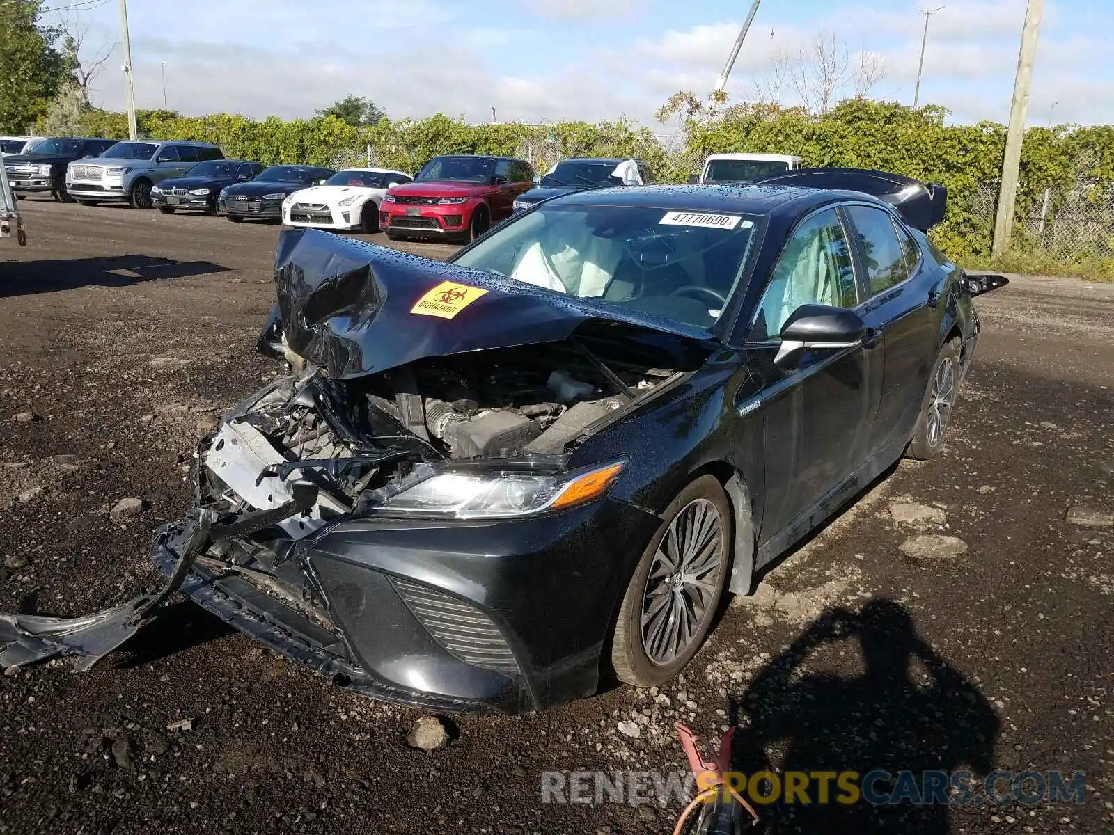 2 Photograph of a damaged car 4T1B21HK0KU517594 TOYOTA CAMRY 2019