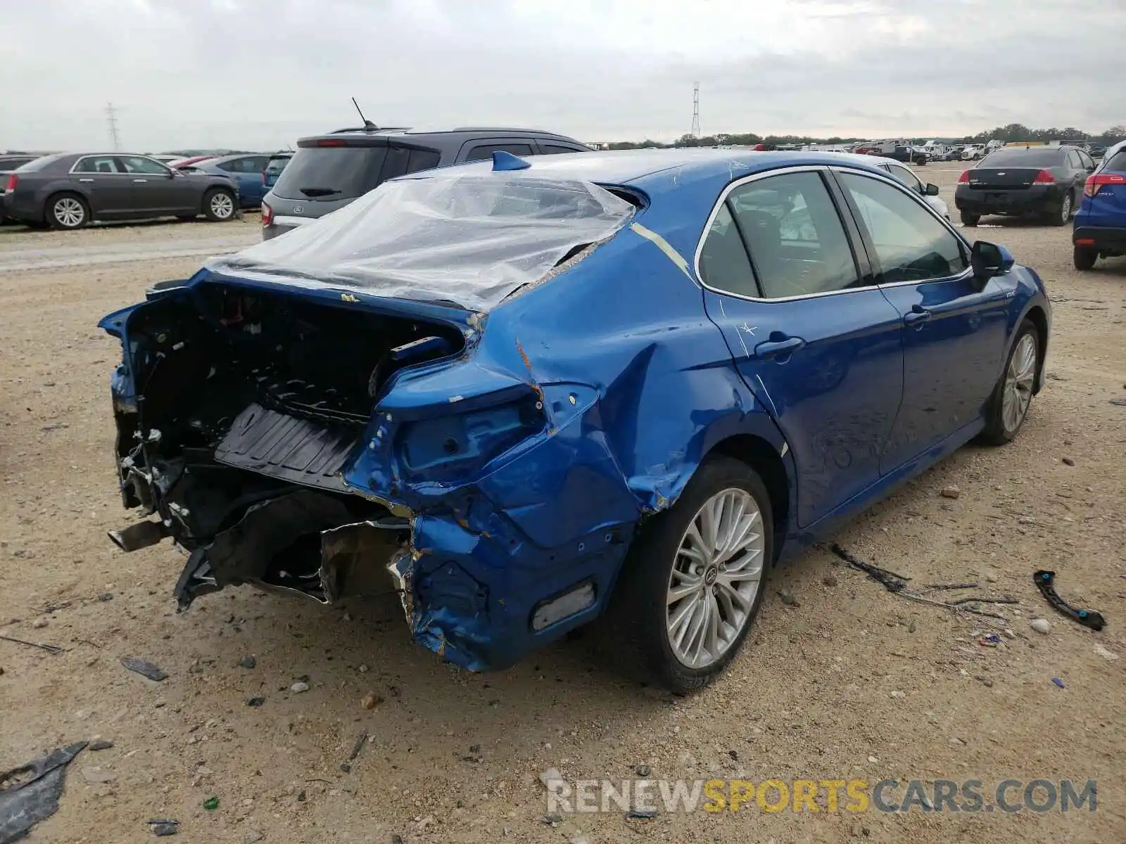 4 Photograph of a damaged car 4T1B21HK1KU013457 TOYOTA CAMRY 2019