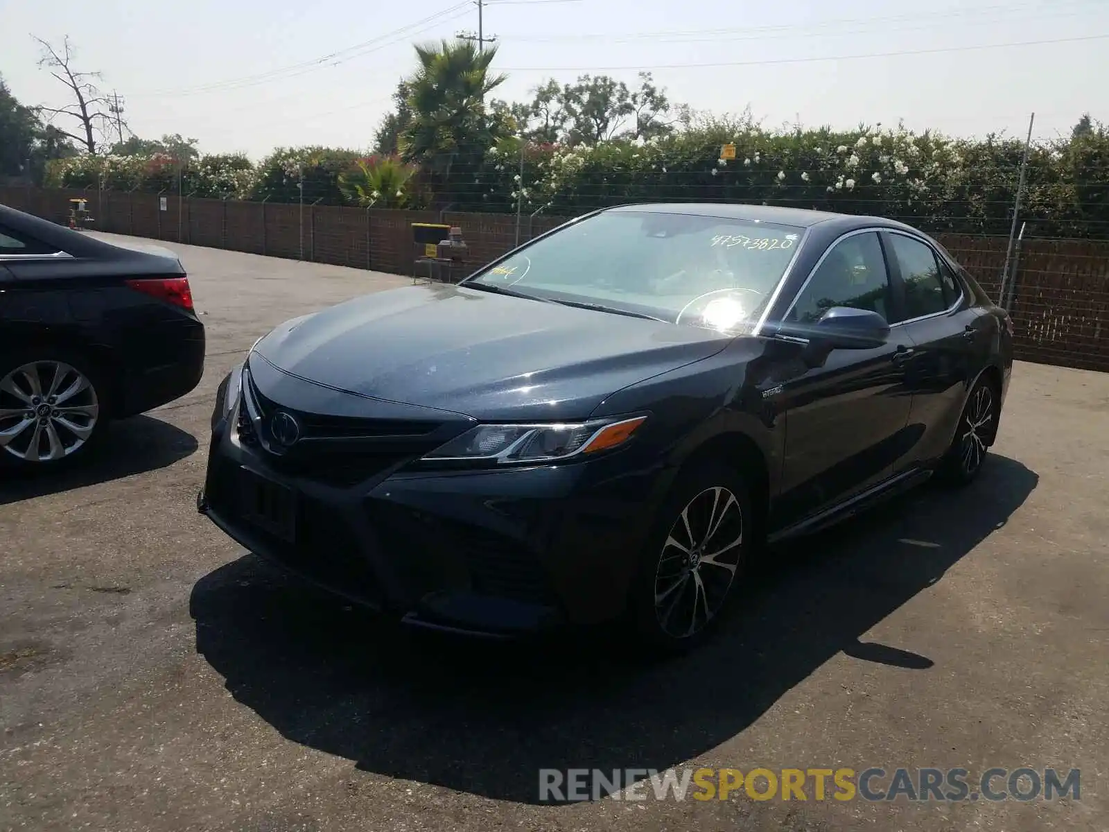 2 Photograph of a damaged car 4T1B21HK1KU512081 TOYOTA CAMRY 2019